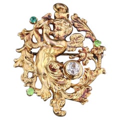 Antique Diamond and Demantoid Garnet Cherub Pendant of 14k Gold