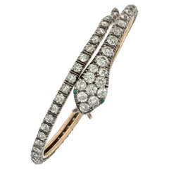 Antique diamond and emerald articulated coiled serpent bracelet
