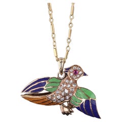 Antique Diamond and Enamel Bird Pendant of 14k Gold