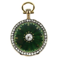 Pendentif porte-montre ancien en émail guilloché et diamants