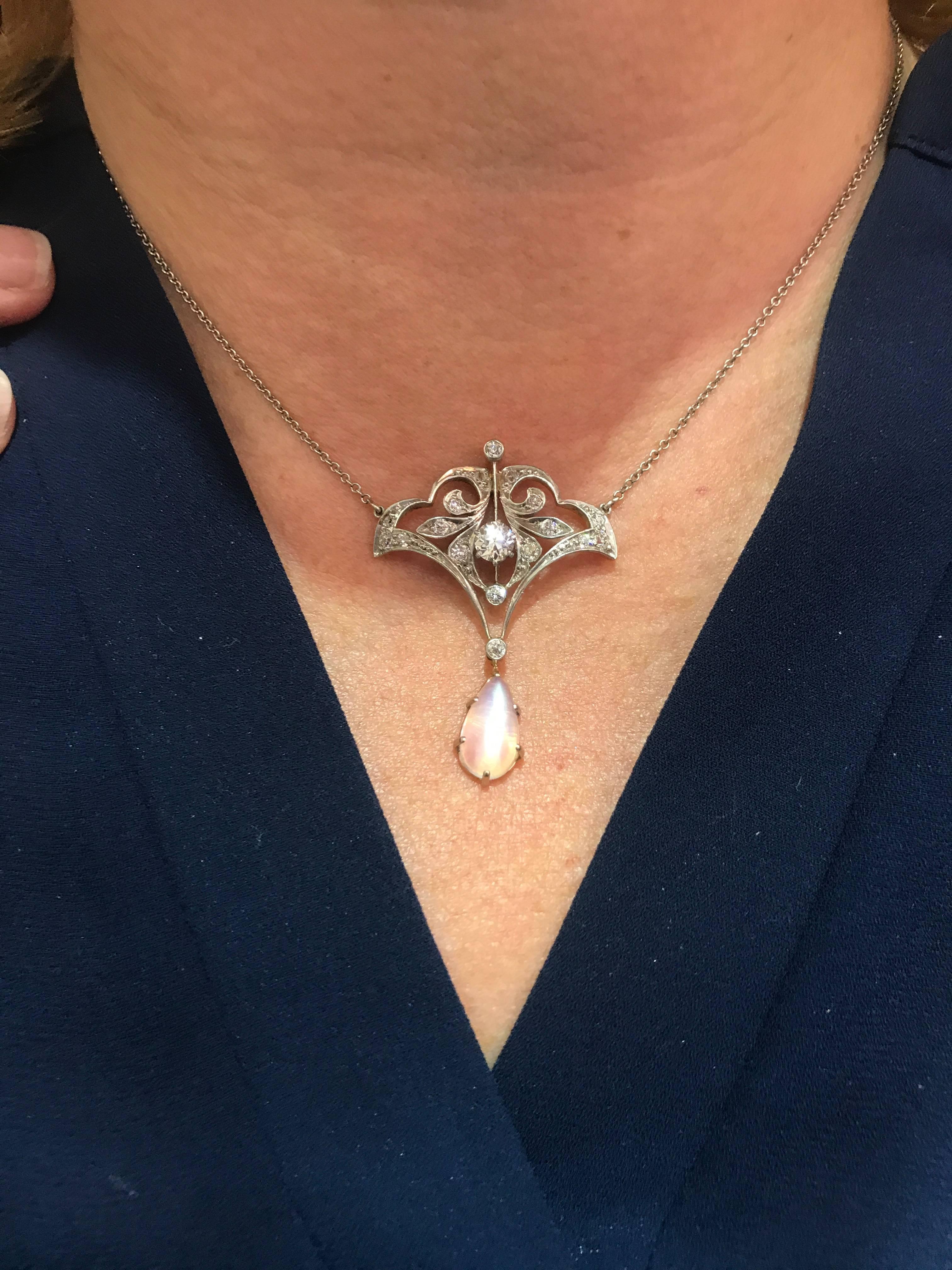 Antique Diamond and Moonstone Pendant set in Platinum and 14 Karat White Gold In Excellent Condition For Sale In New Orleans, LA