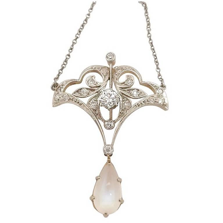 Antique Diamond and Moonstone Pendant set in Platinum and 14 Karat White Gold For Sale