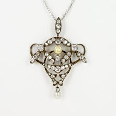 Pendentif ancien en argent sur or avec diamants et perles naturelles