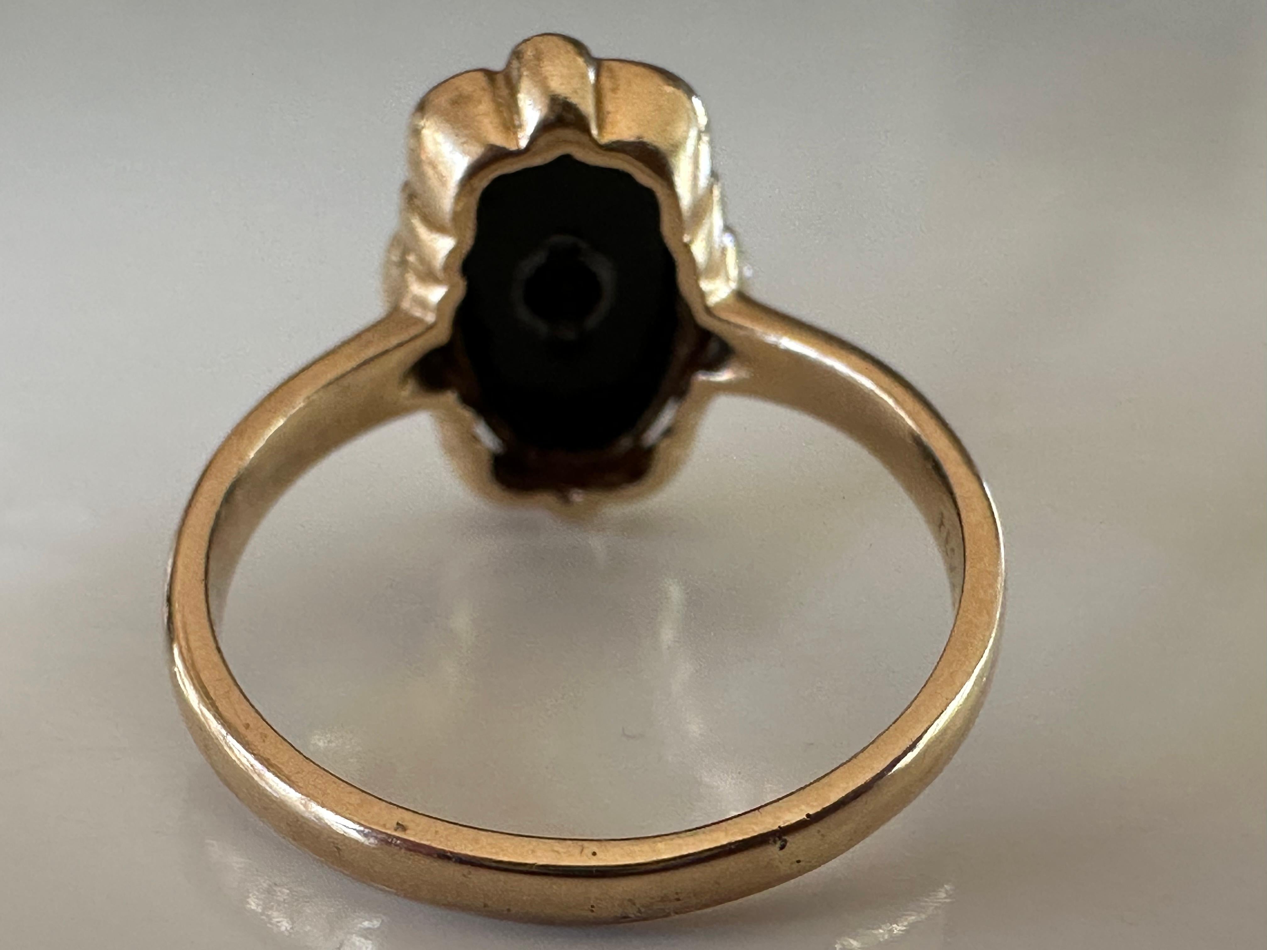 antique black onyx ring with diamond