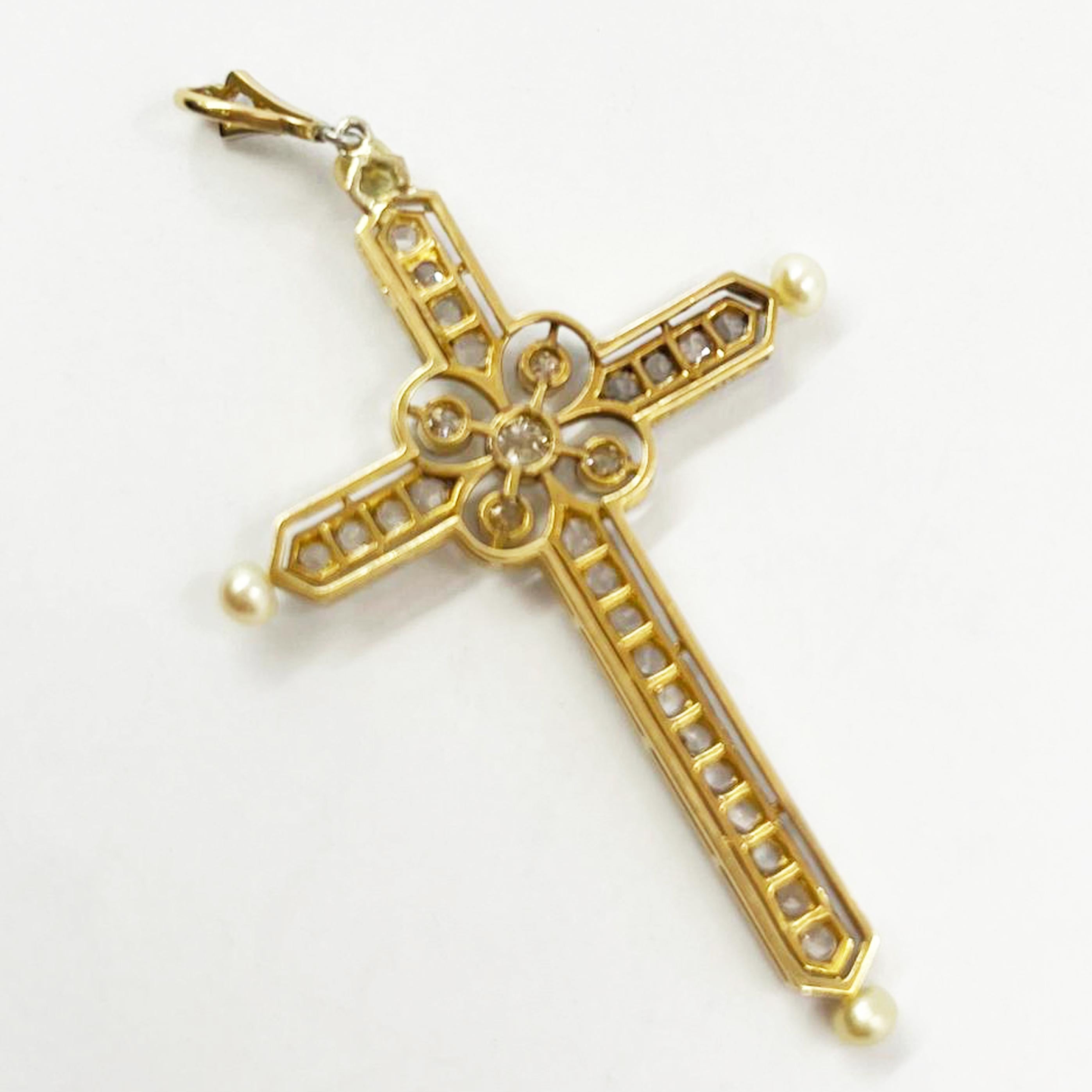 Antique Platinum and 18 Karat Yellow Gold Diamond Cross Pendant Featuring 5  Old European Cut and 23 Rose Cut Diamonds of VS/SI Clarity and H/I Color Totaling 0.50 Carats, Accented by 4 Seed Pearls. 2.5 Inches Long with a Finished Weight of 4.9