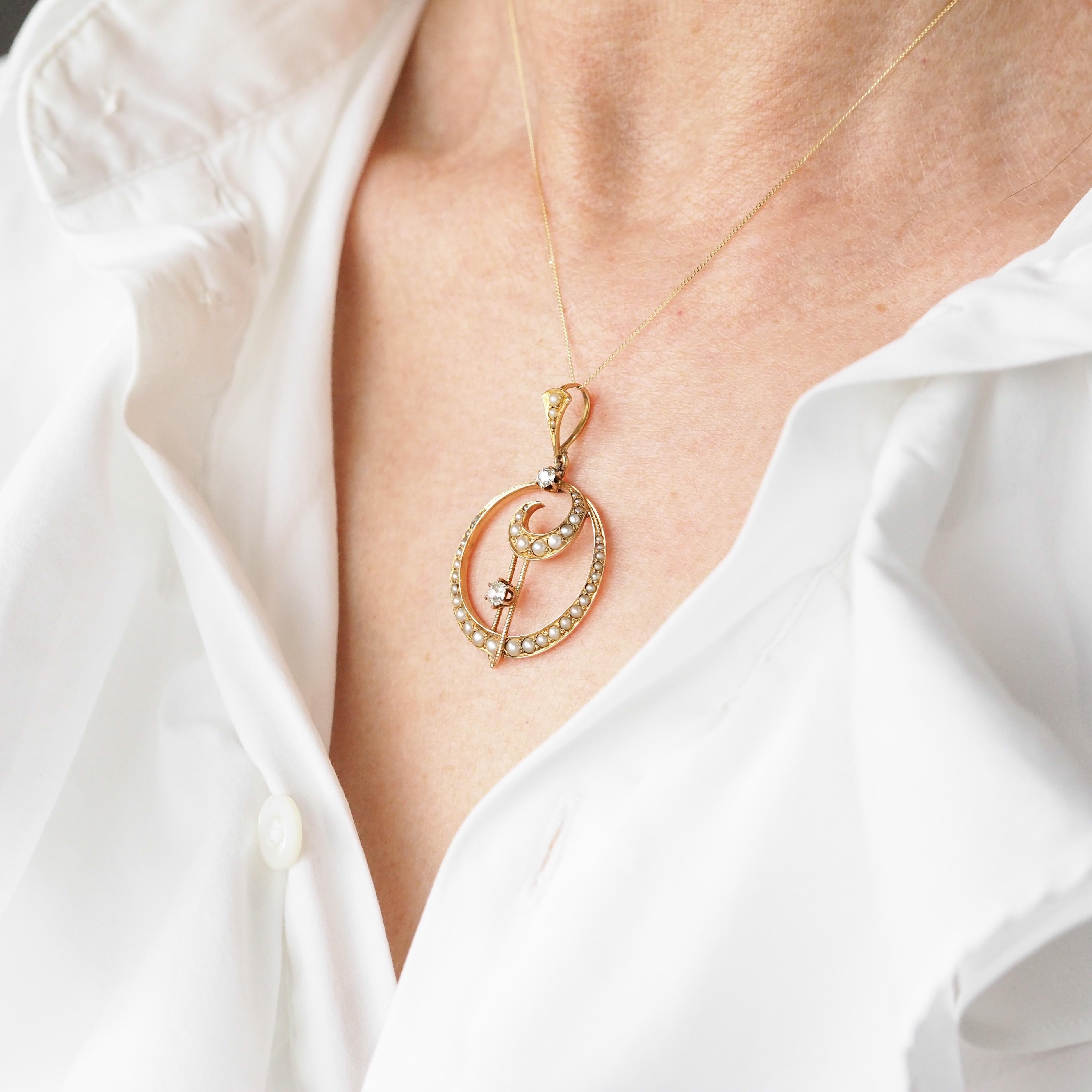 We are delighted to offer this splendid late Victorian/early Edwardian double crescent pendant necklace made c.1900 in 14ct solid gold. 

Celestial, classical and captivating, this necklace is immediately eye catching and distinguishes itself from