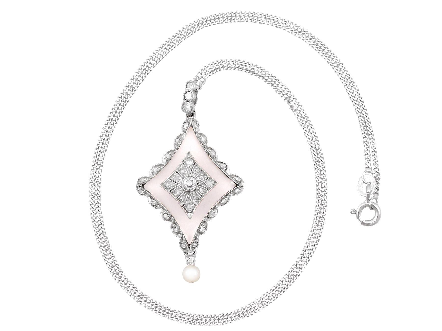 An impressive antique 0.32 carat diamond and seed pearl, rock crystal and 9 karat white gold pendant; part of our diverse antique jewelry and estate jewelry collections.

This fine and impressive antique pendant has been crafted in 9k white