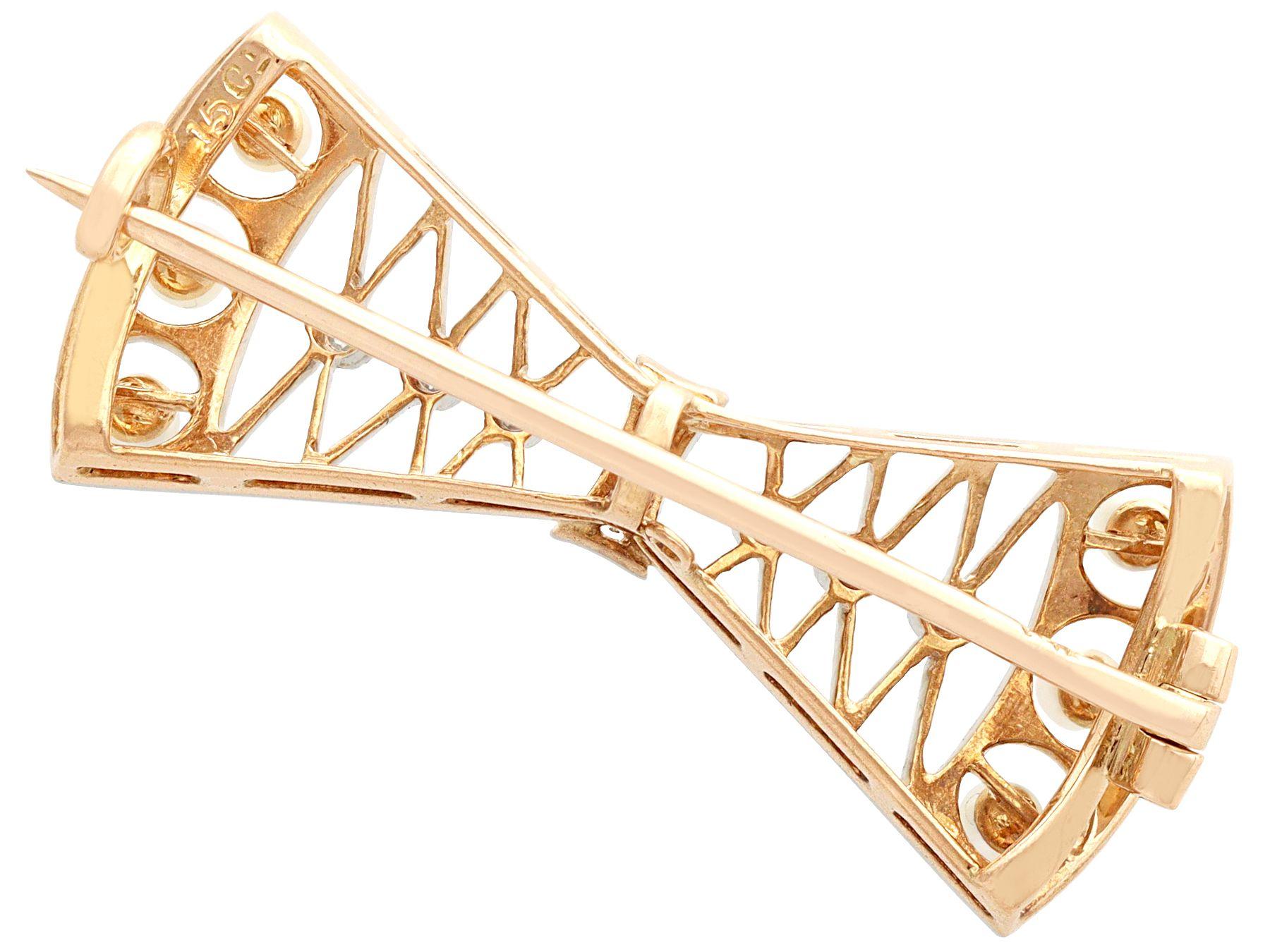 1920s Diamond and Pearl 15K Yellow Gold Bow Brooch In Excellent Condition For Sale In Jesmond, Newcastle Upon Tyne