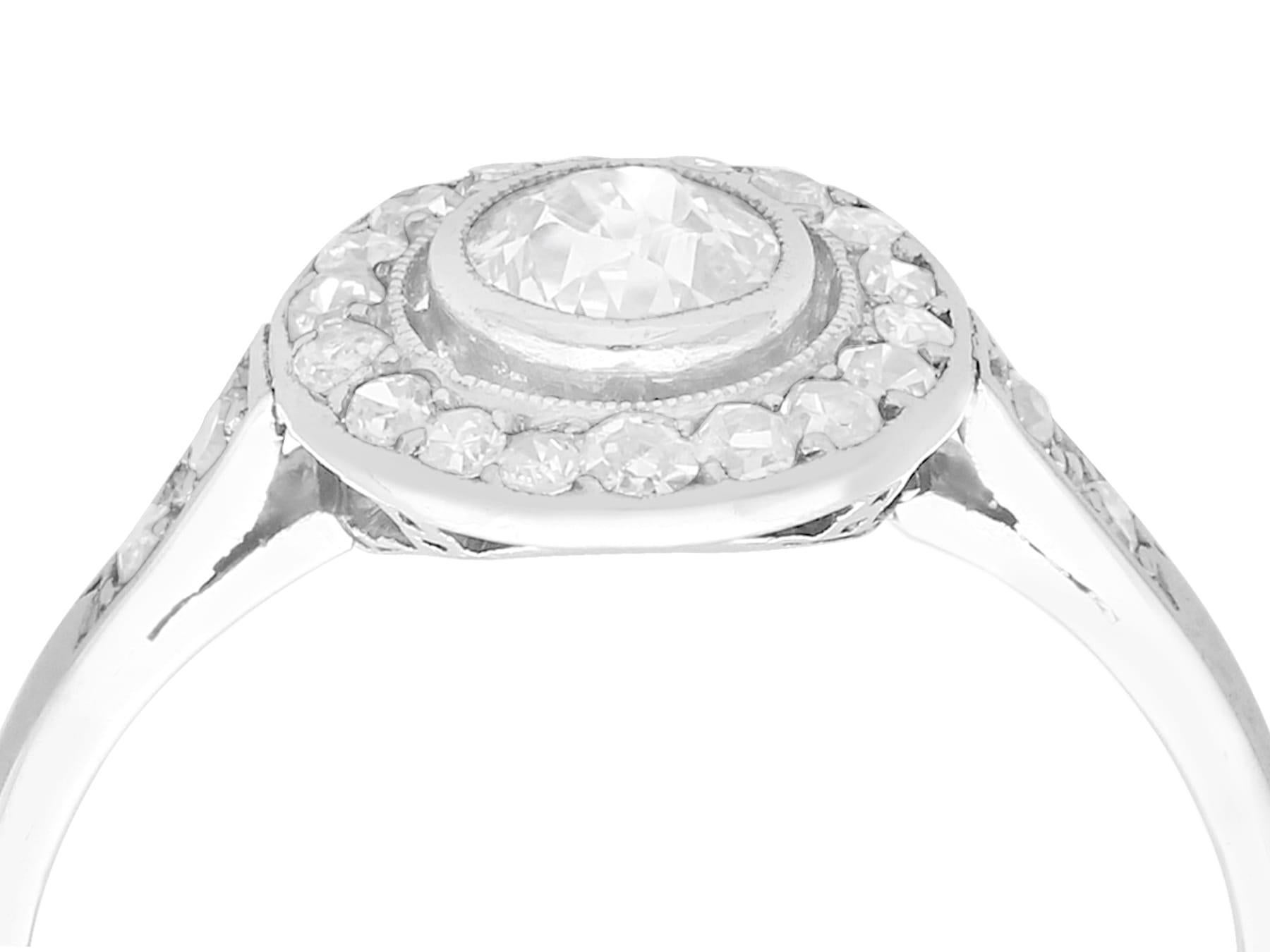 A fine and impressive antique 0.63 carat diamond and platinum cluster ring; part of our diverse antique jewelry and estate jewelry collections.

This fine and impressive diamond vintage ring has been crafted in platinum.

The millegrain decorated