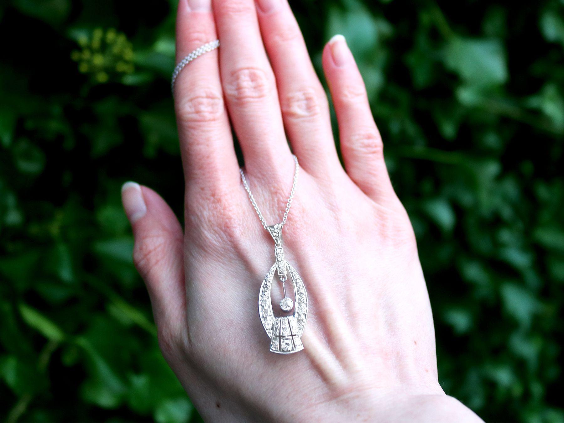 A fine and impressive antique Art Deco 0.88 carat diamond and platinum pendant; part of our diverse antique jewellery and estate jewelry collections.

This fine and impressive antique diamond pendant has been crafted in platinum.

The pierced