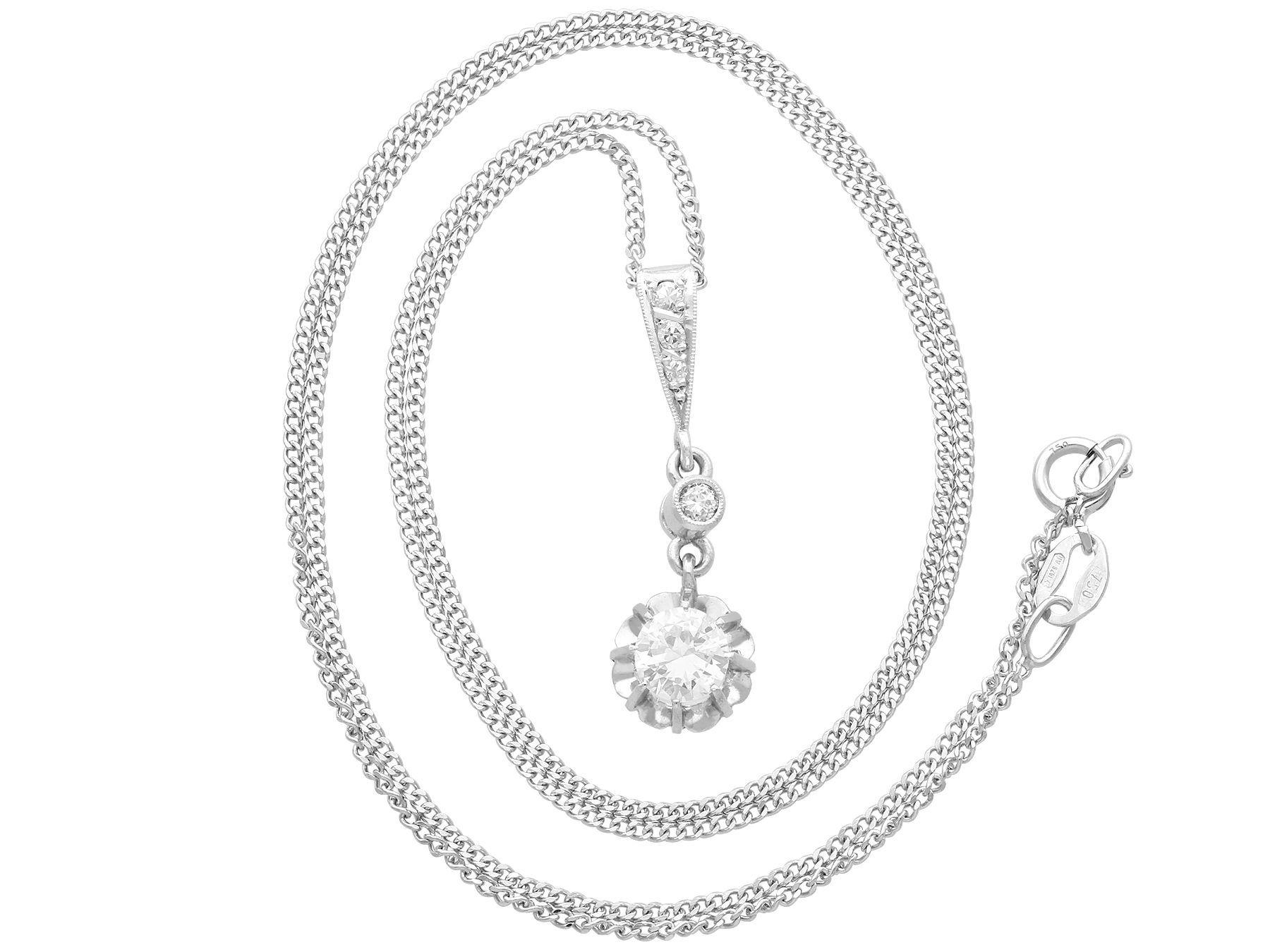 A stunning, fine and impressive antique 0.53 carat diamond and platinum pendant; part of our diverse diamond jewelry collections.

This stunning, fine and impressive antique diamond pendant has been crafted in platinum.

The drop pendant consists of