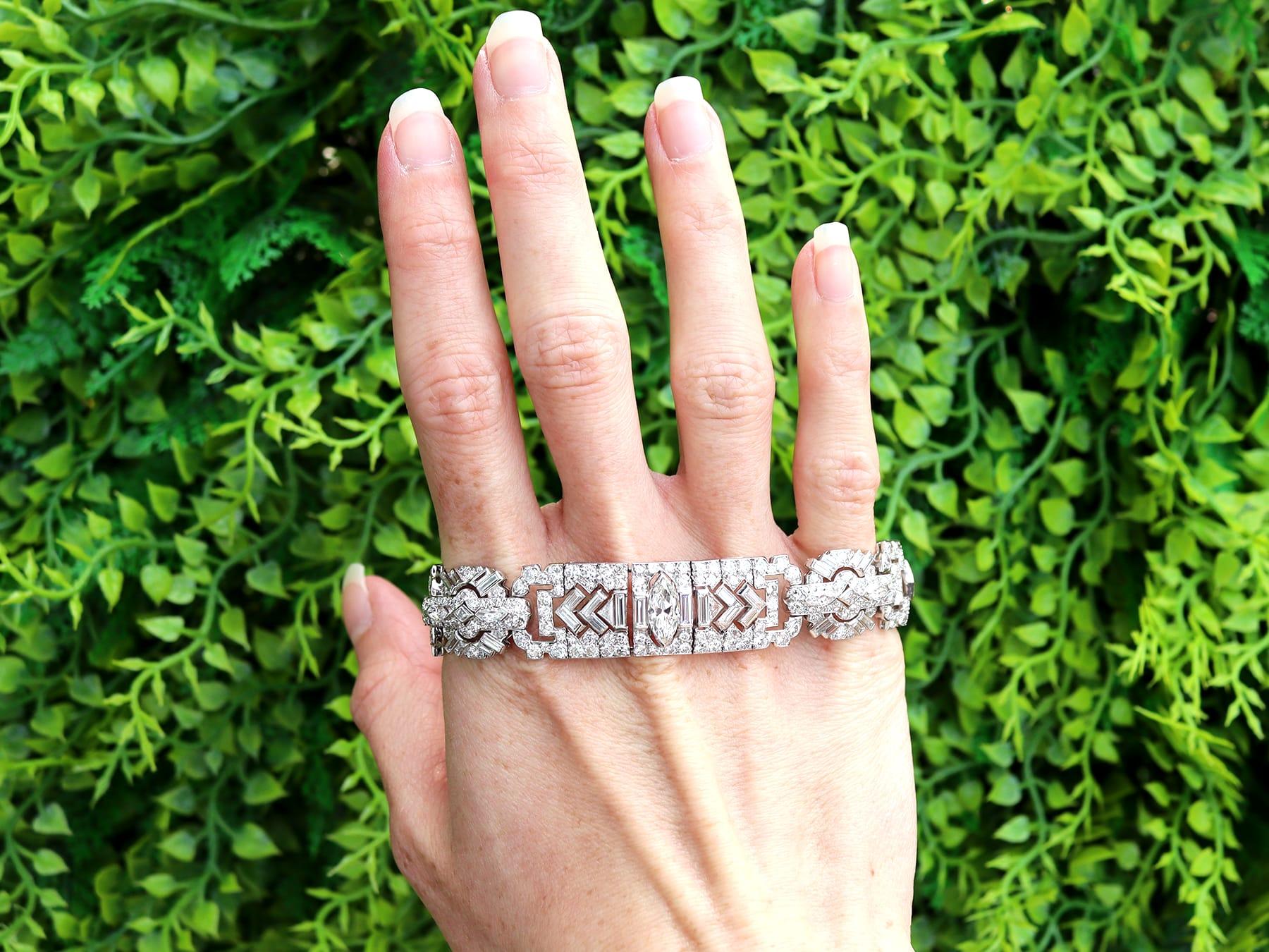 A magnificent, stunning, fine and impressive antique 14.31 carat diamond and platinum bracelet; part of our diverse statement diamond jewellery collection. 

This magnificent, fine and impressive antique Art Deco diamond bracelet has been crafted in