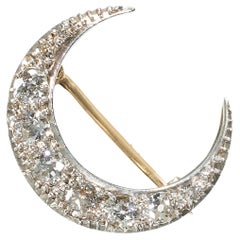 Antique Diamond and Silver Upon Gold Crescent Brooch Circa 1880 1.11 Carats
