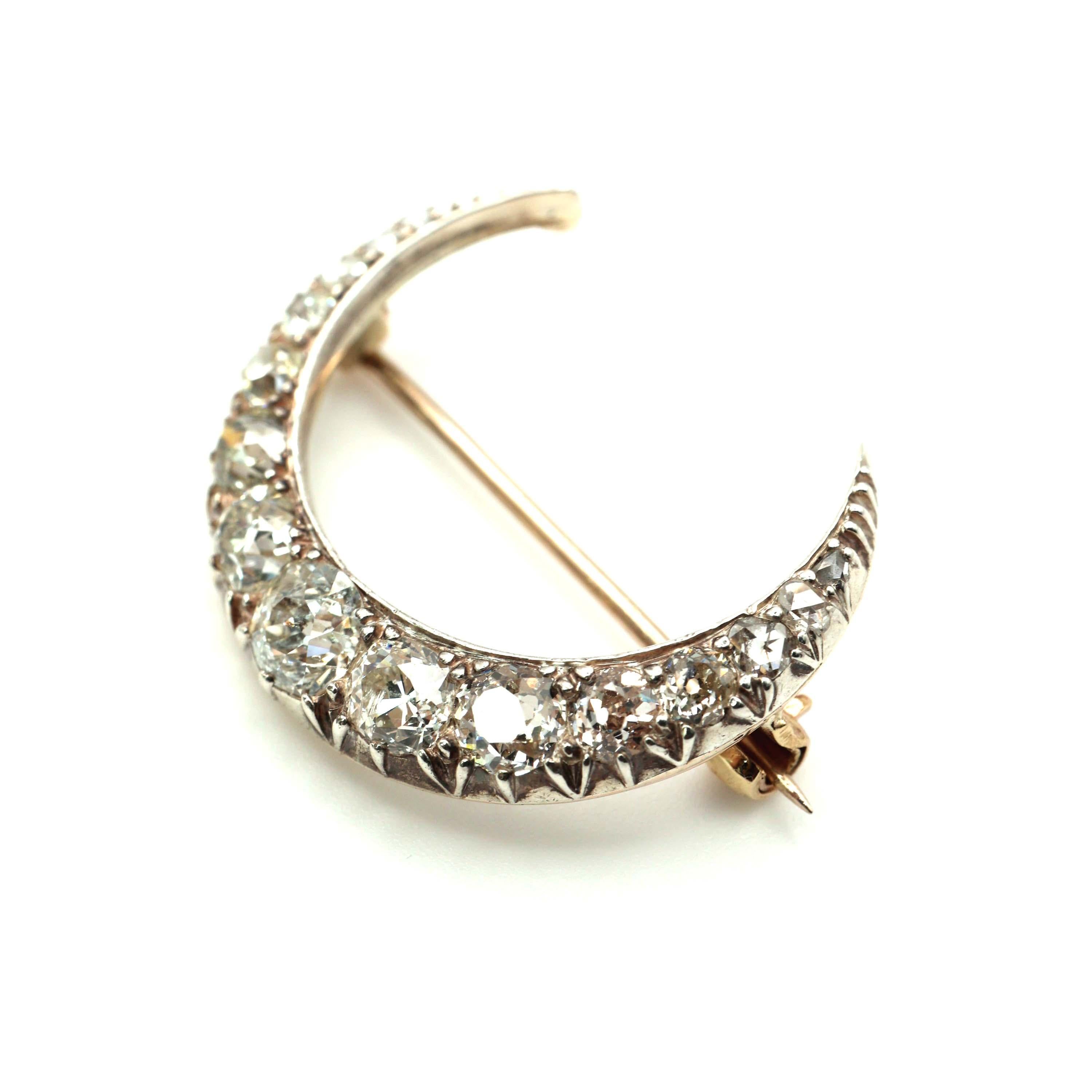 Late Victorian Antique Diamond and Silver Upon Gold Crescent Brooch, Circa 1890, 4.00 Carats For Sale