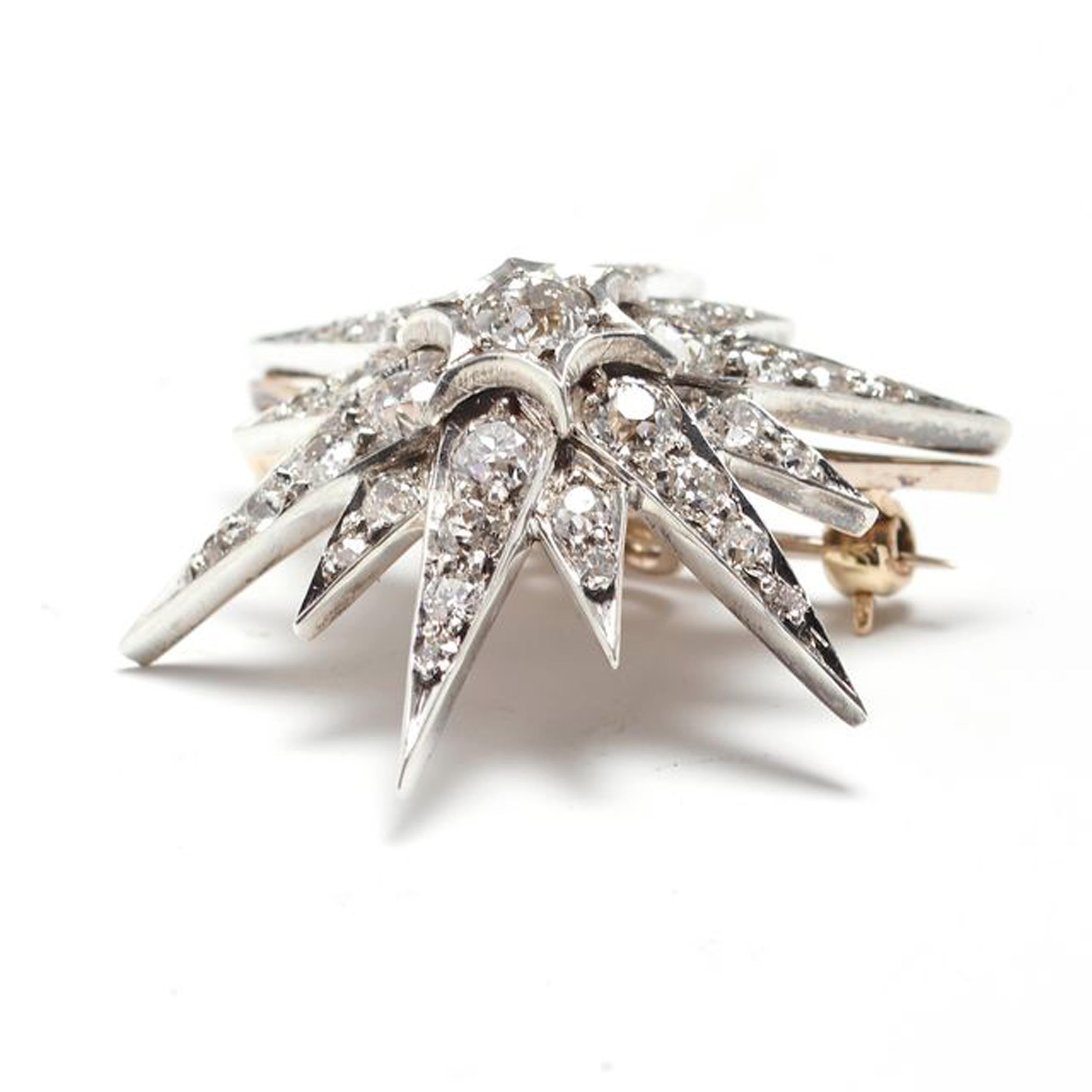 Late Victorian Antique Diamond and Silver Upon Gold Star Brooch, Circa 1890 For Sale