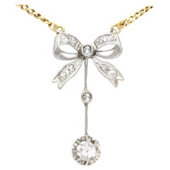 Antique Diamond and White Gold Bow Pendant, Circa 1920