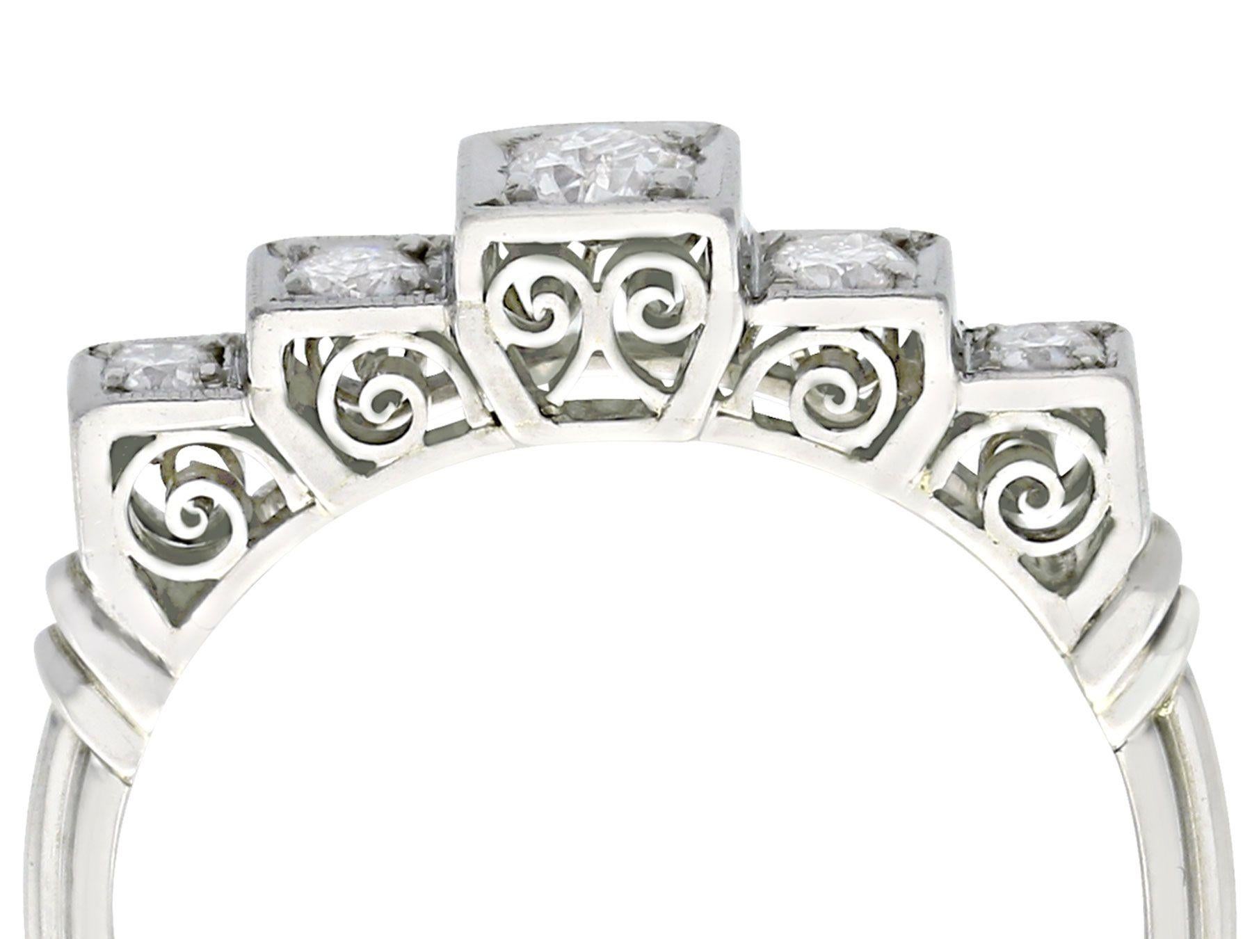 An impressive antique 0.35 carat diamond and 18 karat white gold five stone cocktail ring; part of our diverse antique jewelry and estate jewelry collections.

This fine and impressive graduated five stone diamond ring has been crafted in 18 k white
