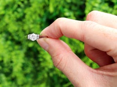 Antique Diamond and 18K White Gold Solitaire Engagement Ring