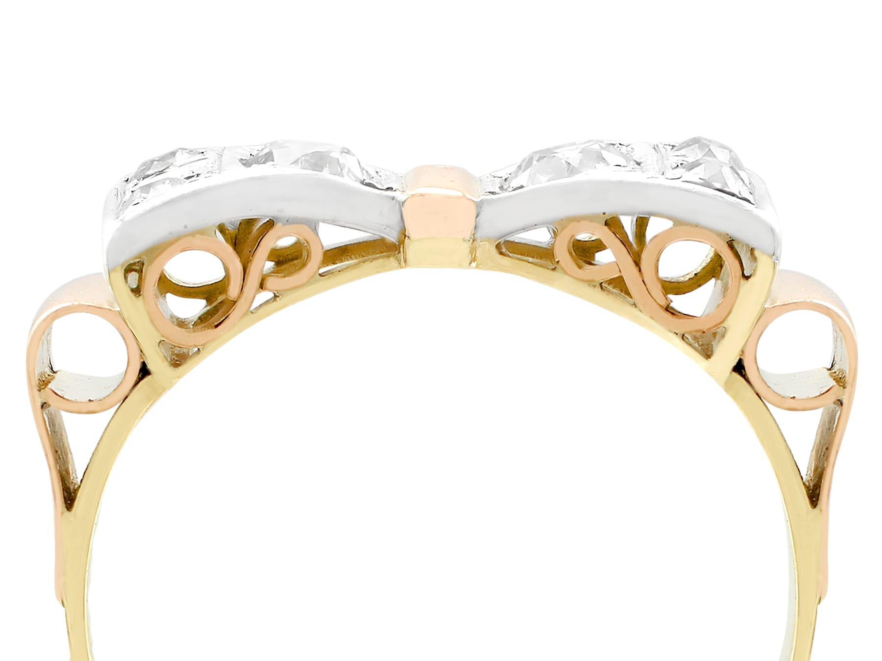 An impressive antique Dutch 0.42 carat diamond and 14 karat rose and yellow gold, silver set bow design dress ring; part of our diverse antique jewelry and estate jewelry collections.

This fine and impressive antique diamond band ring has been