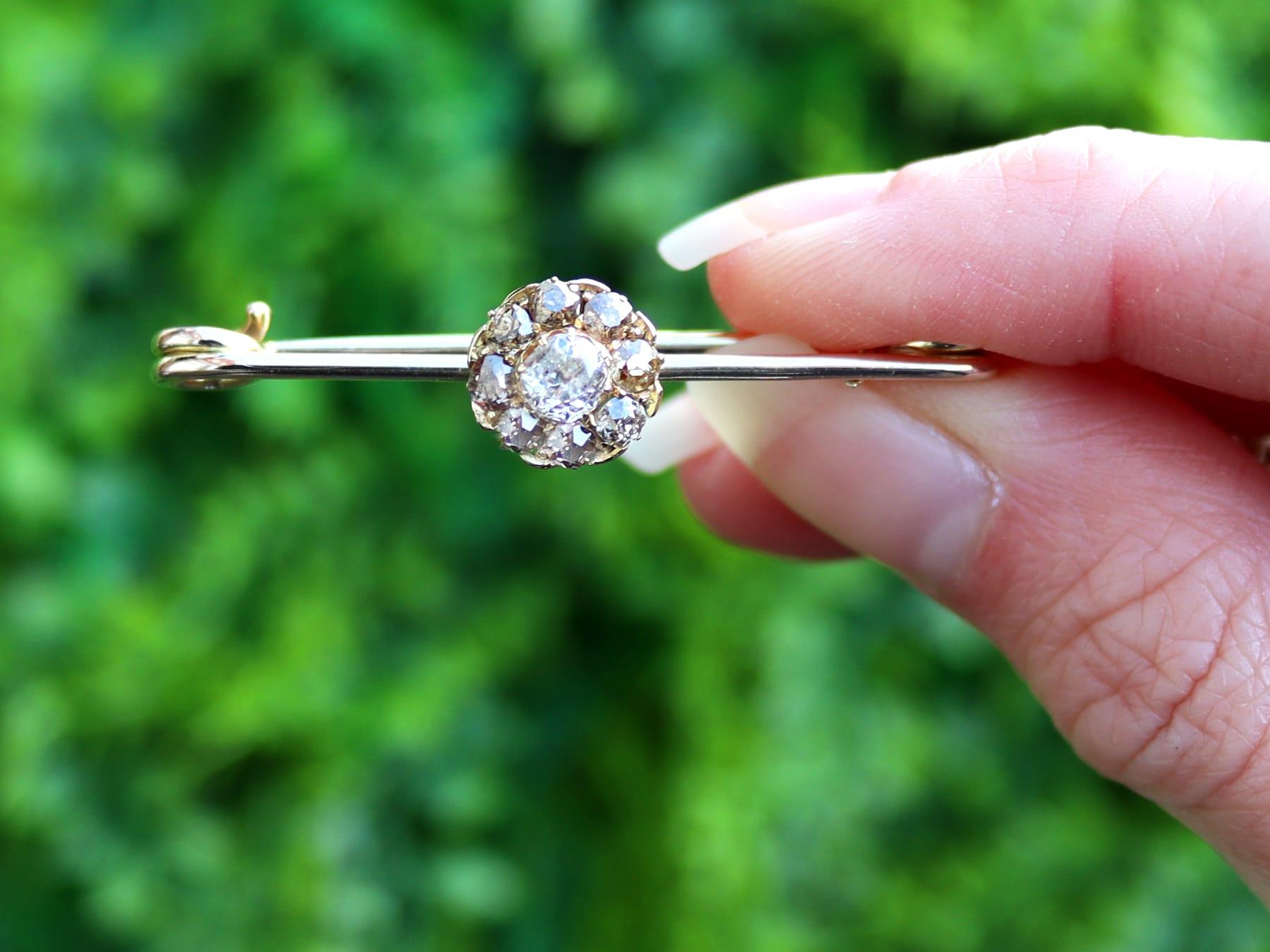 An impressive antique 0.56 carat diamond, 9 karat yellow gold bar brooch; part our antique jewelry and estate jewelry collections.

This antique late Victorian diamond brooch has been crafted in 9k yellow gold.

The antique bar brooch displays a