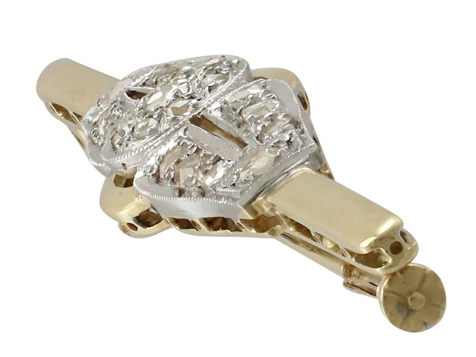 A fine and impressive antique 0.57 carat diamond and 18 karat yellow gold, 18 karat white gold set bar brooch; part of our diverse antique jewelry collections.

This fine and impressive diamond brooch has been crafted in 18k yellow gold with an 18k