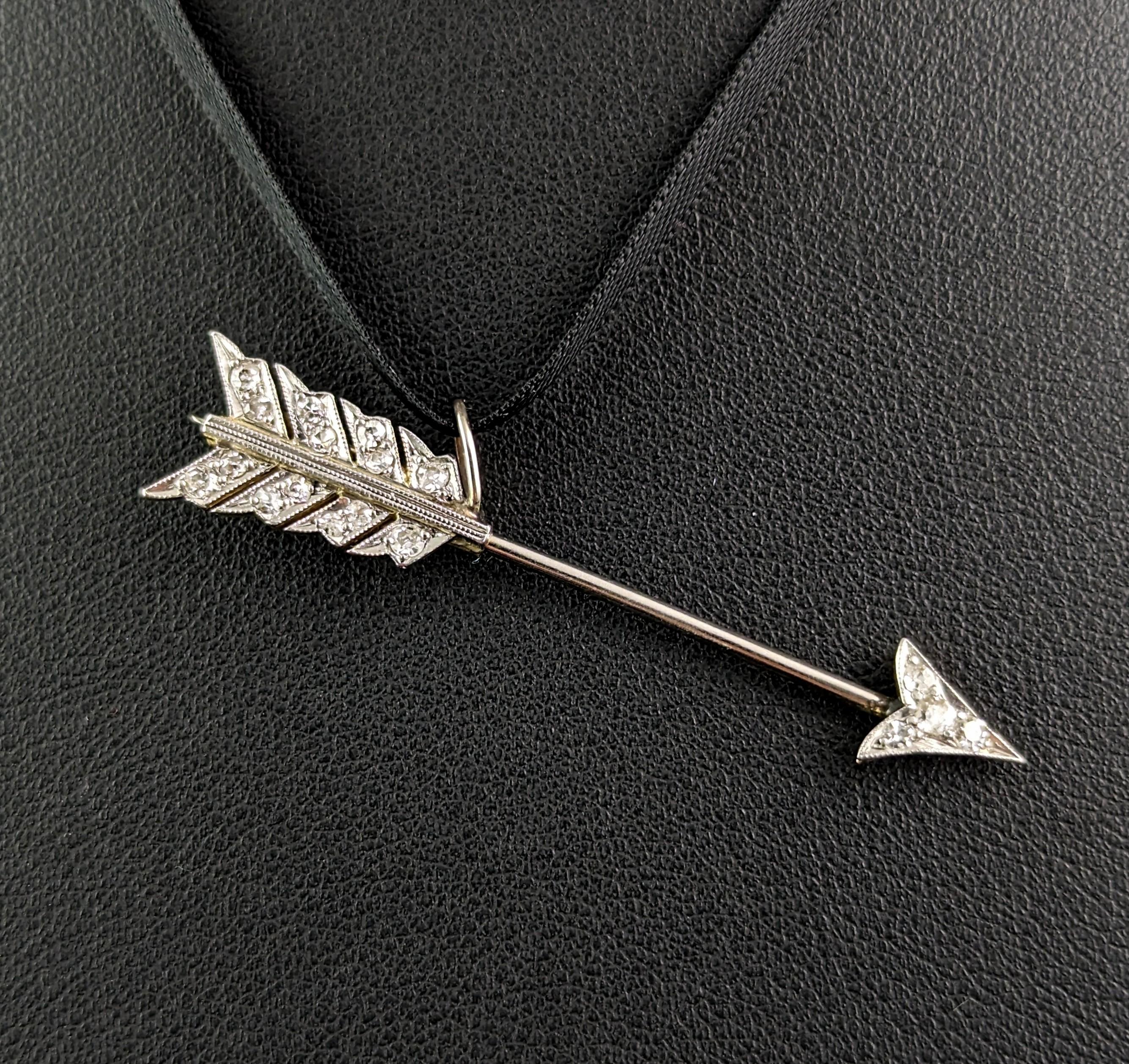 You can't go wrong with this wonderful antique Diamond arrow pendant!

It is a conversion piece, converted from a jabot pin and it is crafted in cool platinum and 15ct yellow gold.

The pendant is studded with old cut diamonds and has plenty of