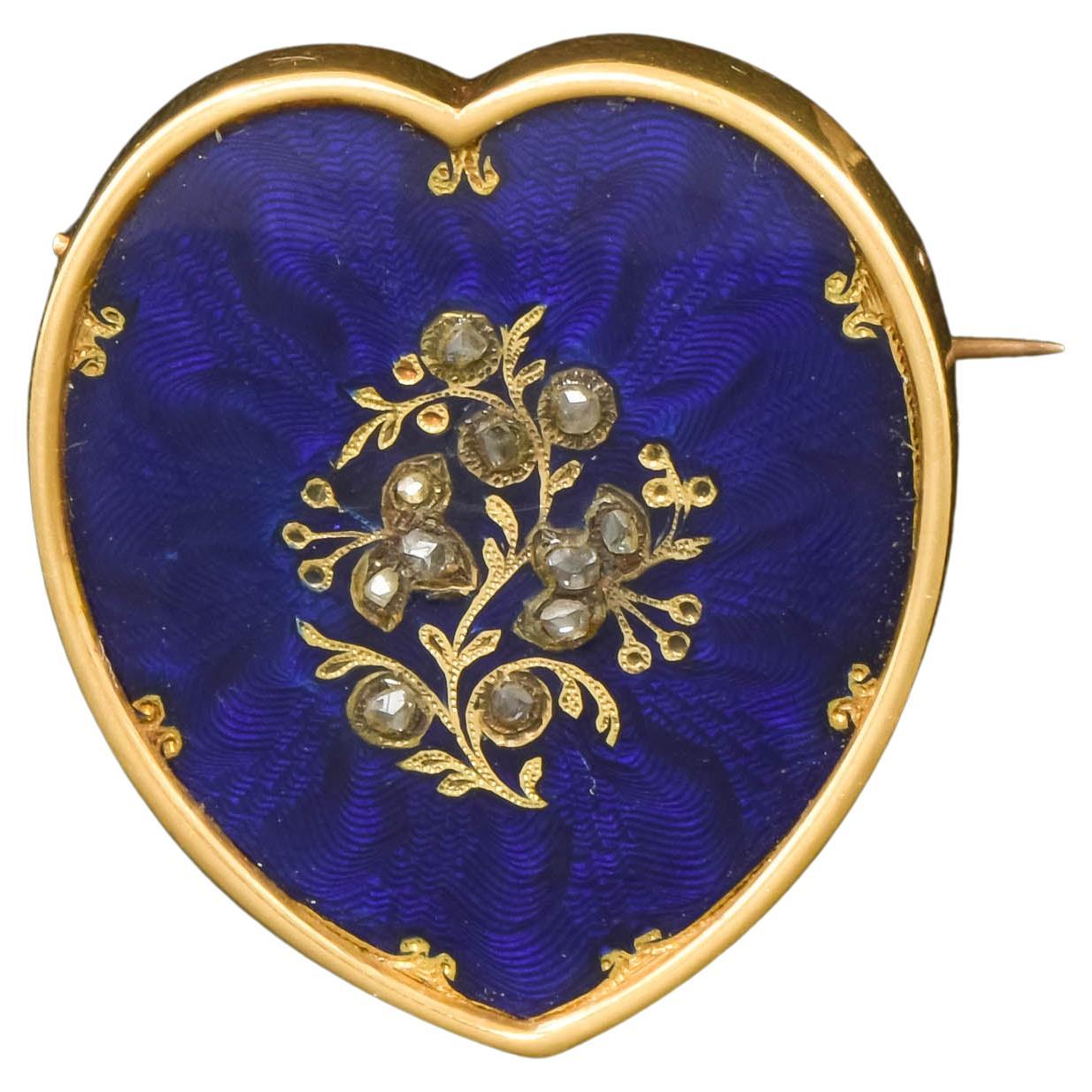 
This elegant and sizable Victorian enamel Heart with rose cut diamond flowers is currently a brooch with watch pin but would also be stunning worn as a pendant.  It does show some wear, so please read the description for details.

Testing as 14k
