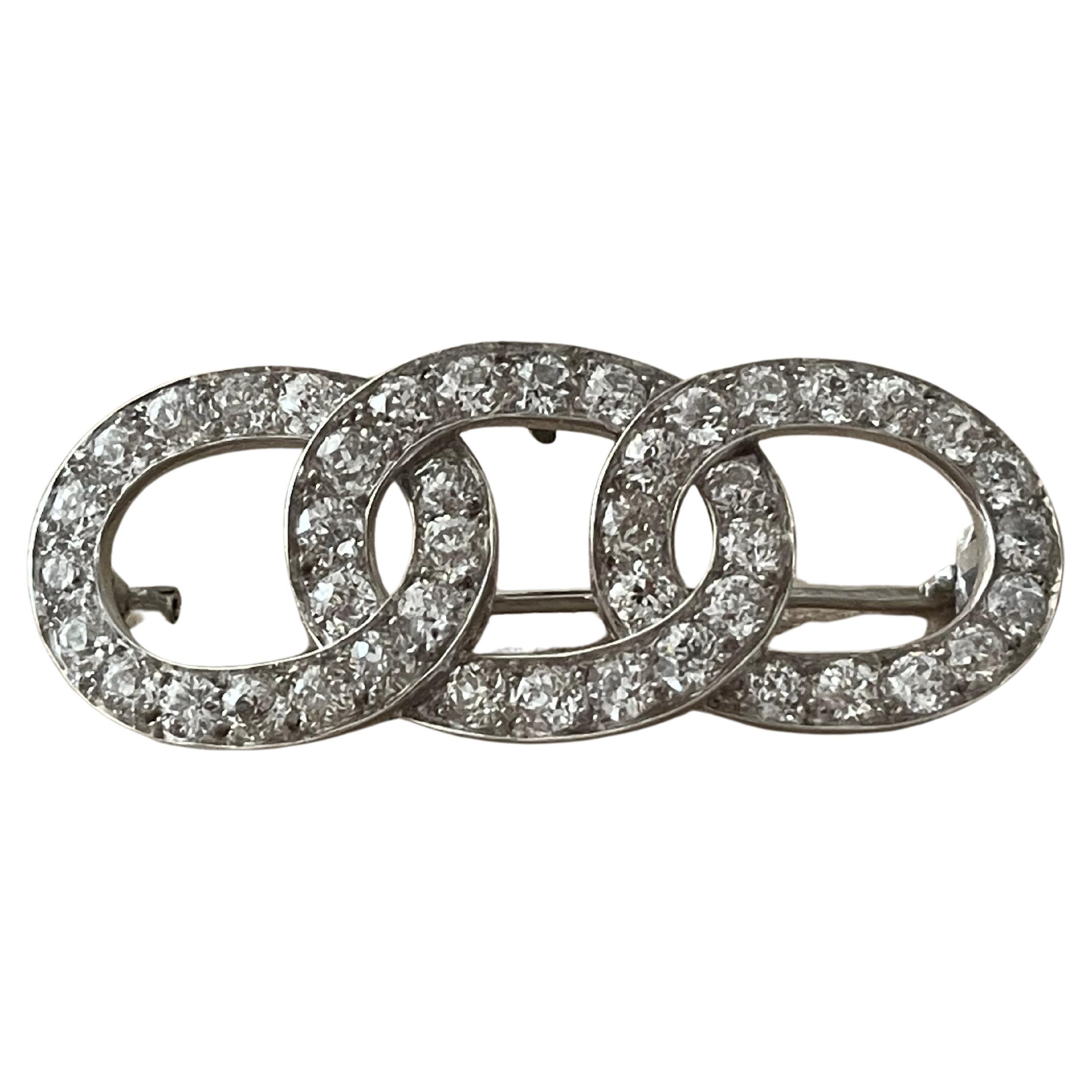 Broche ancienne en diamants ovales reliées entre elles