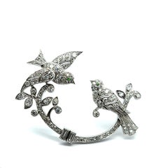 Broche oiseau ancienne en platine et or blanc avec diamants