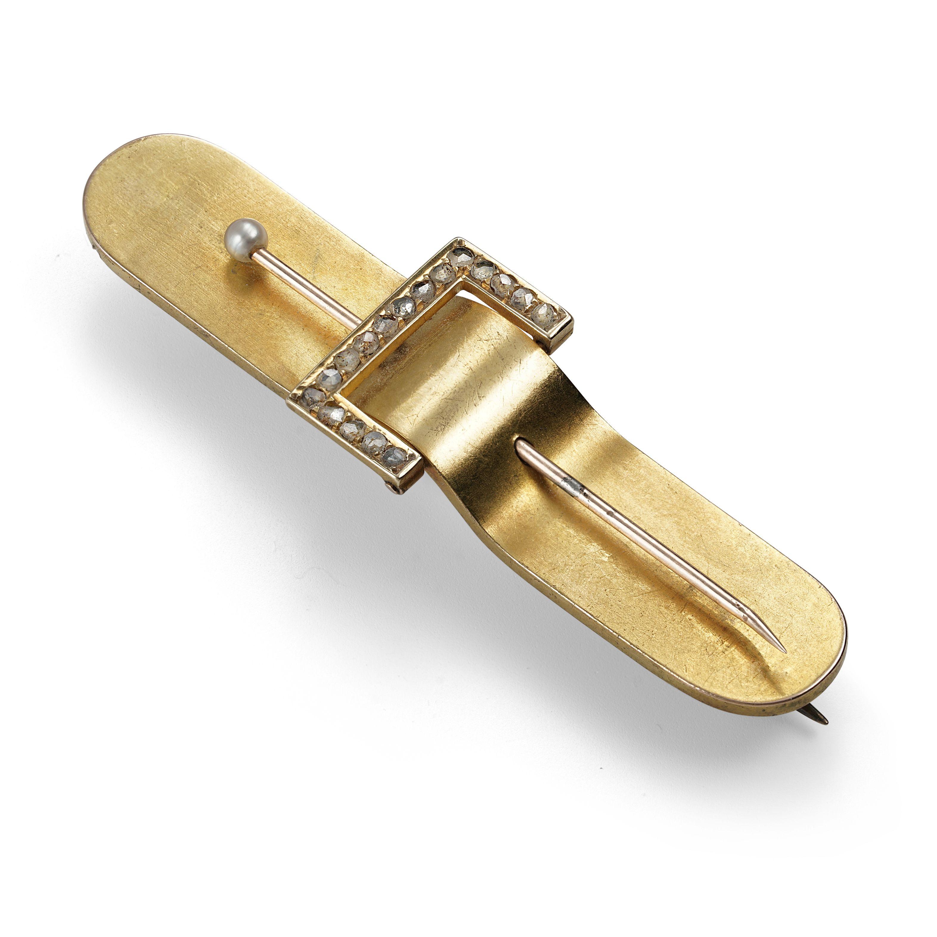 Simply Beautiful! Edwardian Gold Bar Pin centered by a Diamond Buckle hand set with 17 Old Rose-Cut Diamonds. Hand crafted in 14K Yellow Gold. Measuring approx. 2” l x .50” w. In lovely condition. Chic and Classic…Sure to be admired…illuminating