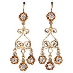 Boucles d'oreilles lustre anciennes en or 14 carats et diamants