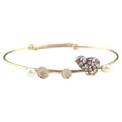 Used Diamond Chick bangle, Ruby, Pearl and White Enamel, 12k gold 