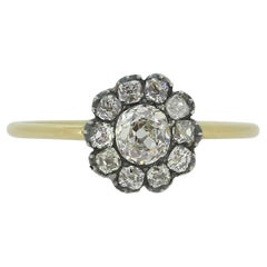 Anillo en racimo de diamantes antiguos