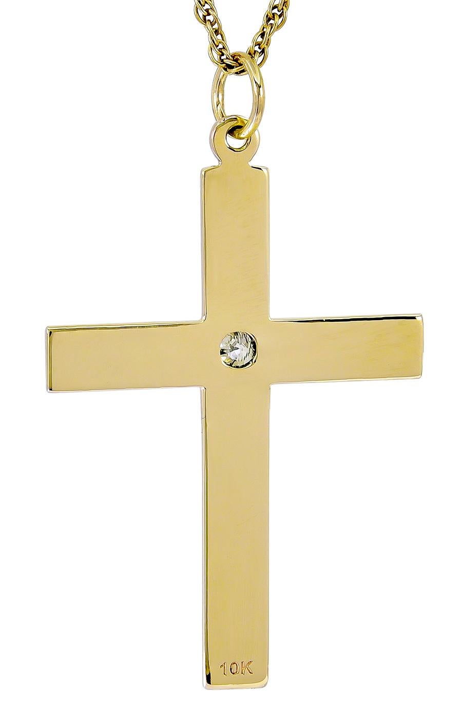 Large beautifully proportioned antique cross, set with a faceted diamond (approximately .20 cts).  10K yellow gold with fine patina.  2