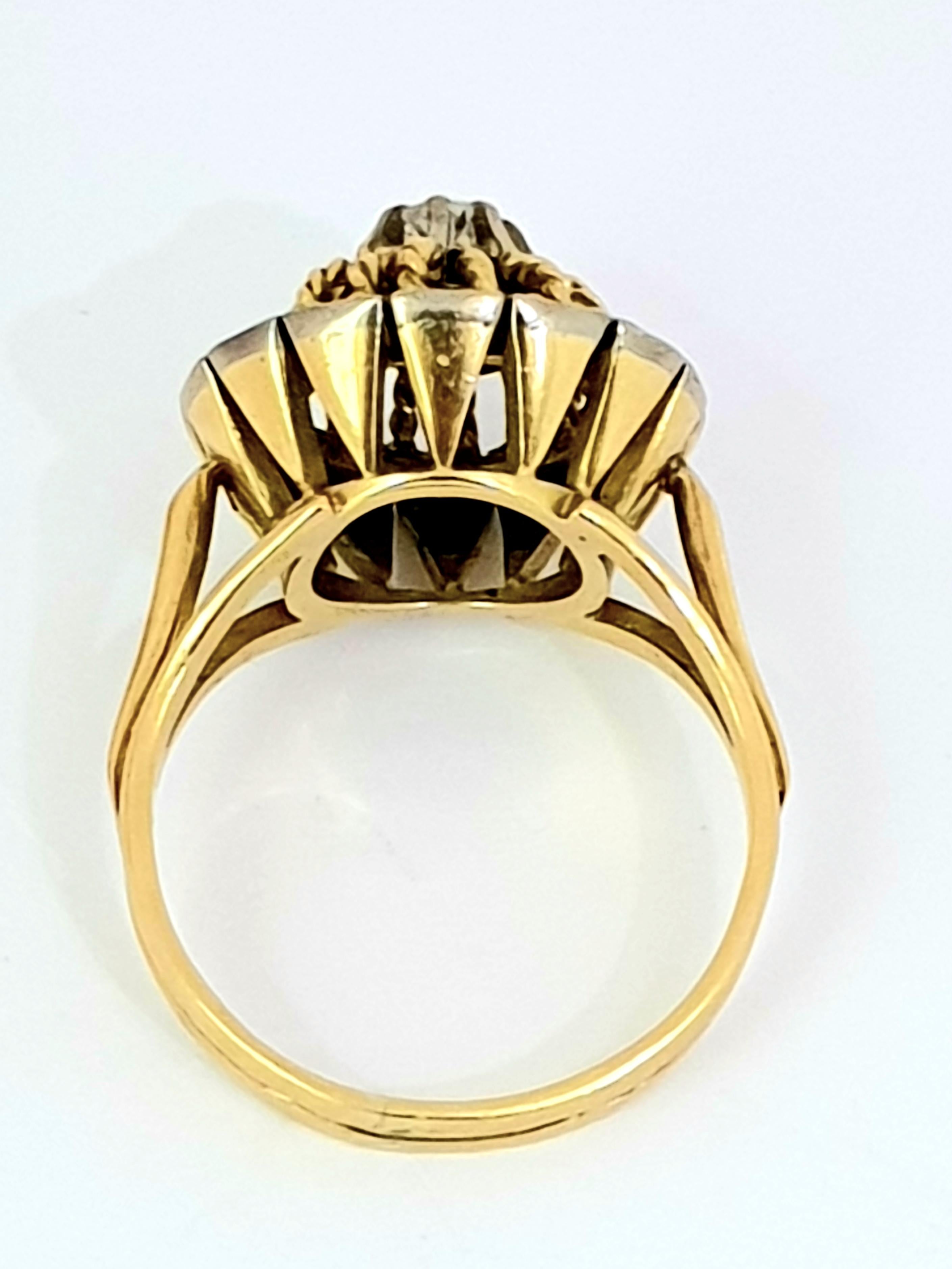 Offering an 18 kt yellow gold antique dome diamond ring . The center old cut diamond is about 0.10 ct. It is surrounded
by 14 0.03 ct diamonds.Total diamond weight is 0.52 ct approx.No visible hallmarked but tested as 18 kt 
Probably french origin.