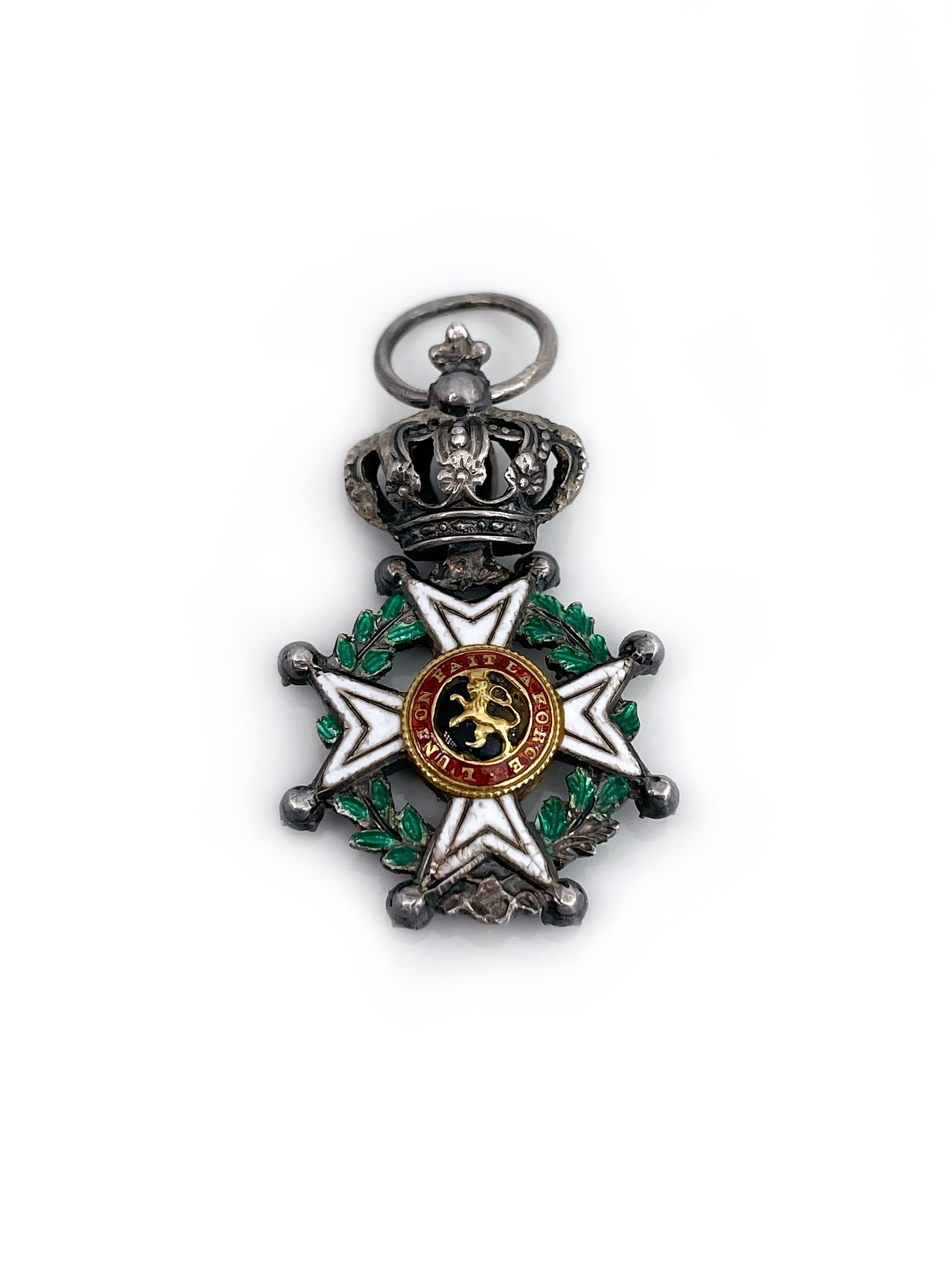 This is a medal knight order of Belgium King Leopold I given to honour a long civilian service. It is crafted in silver, adorned with enamel (average condition) and rose cut diamonds. The piece depicts a Maltese cross with ball tipped finials and