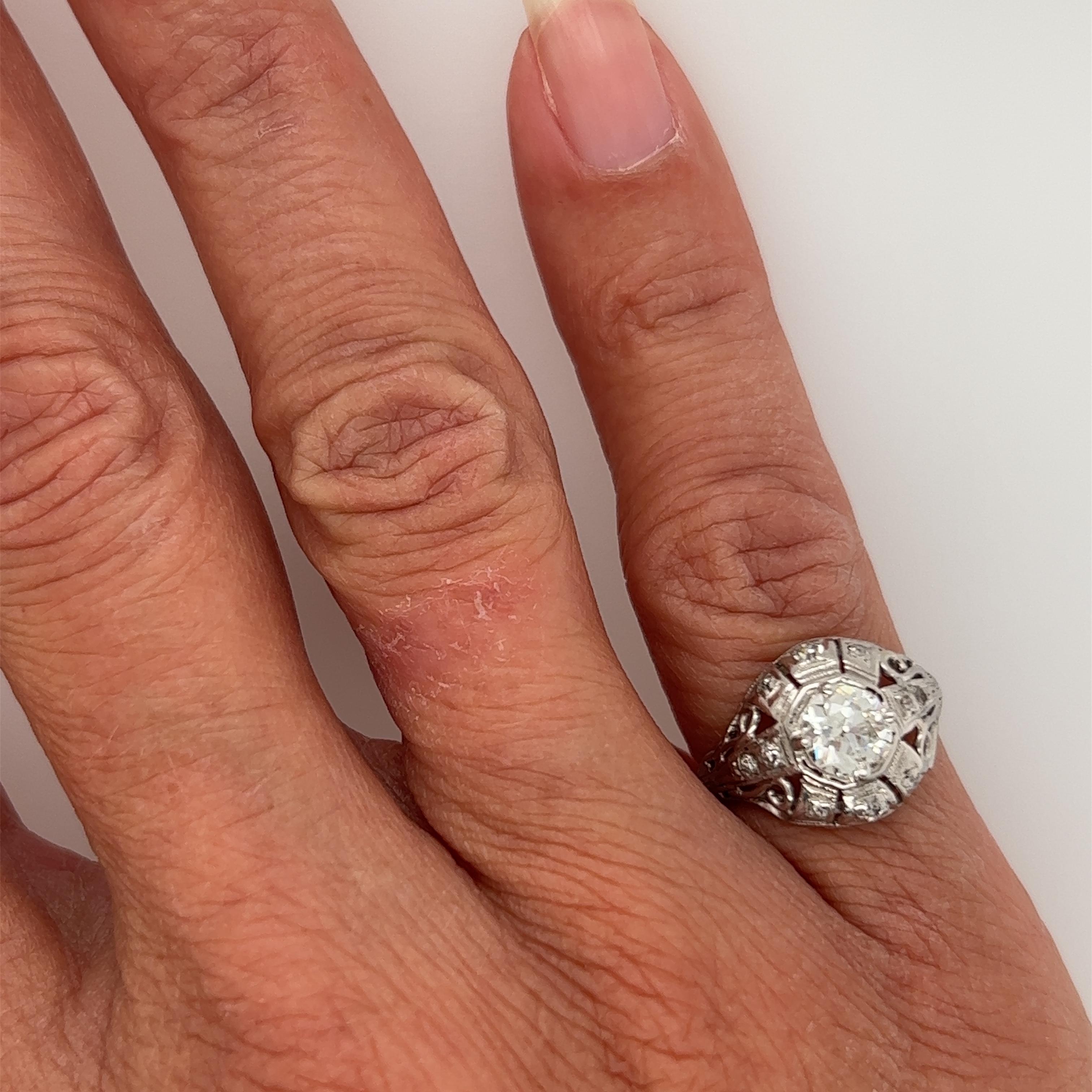 Genuine Original Art Deco Antique from the 1920's EGL Certified .87ct Diamond Ring Platinum



Featuring a Spectacular Genuine Natural Mined .67ct H-SI1 Old European Cut Diamond

World Renowned Universal Gemological Services, Independent Appraisal