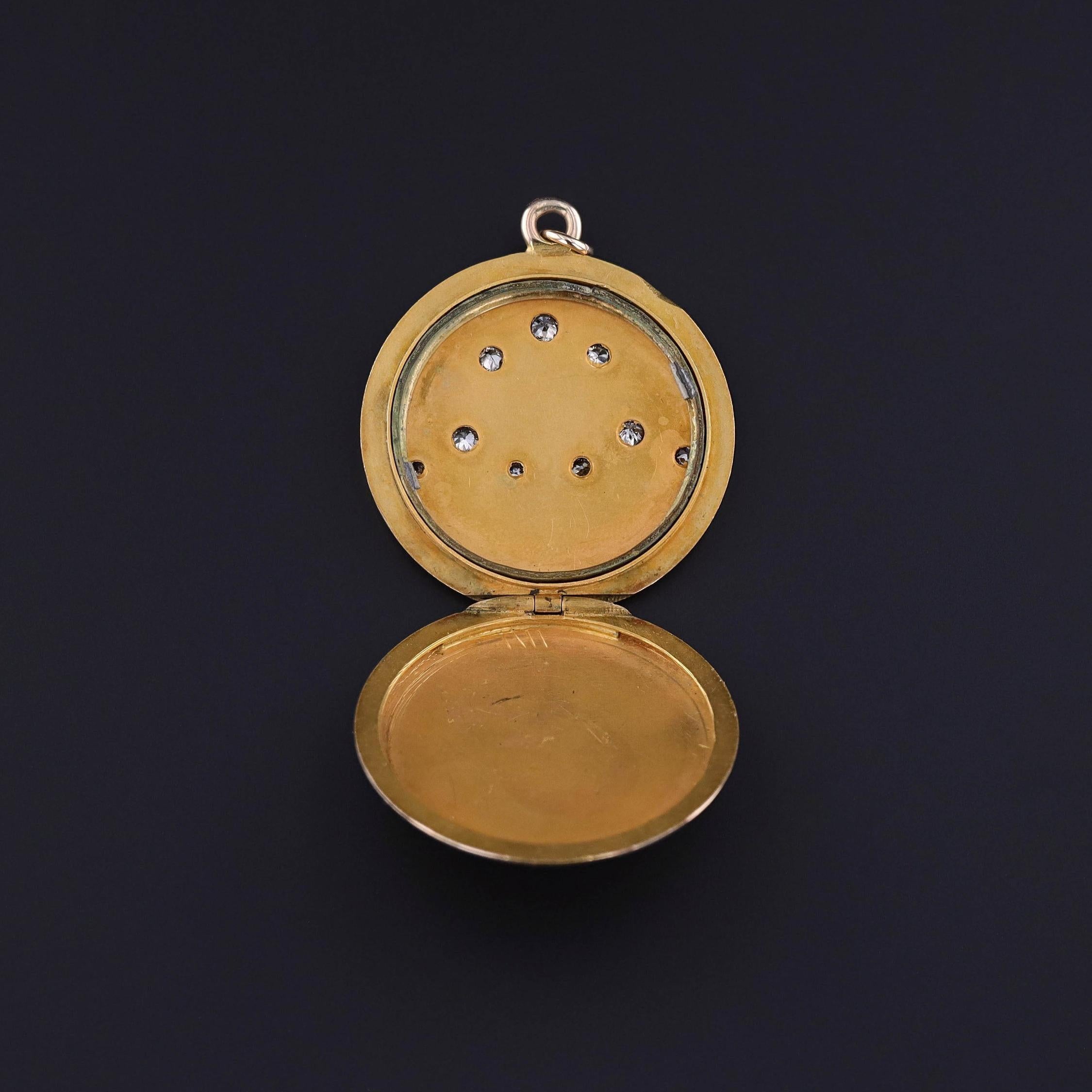 Antique Fleur de Lis Locket: This 10k gold locket (circa 1890-1900) features three diamond accented fleur de lis. The reverse bears the initials KMP.

The locket measures 1.6 inches from the top of the bail to bottom by 1.3 inches wide (when closed)