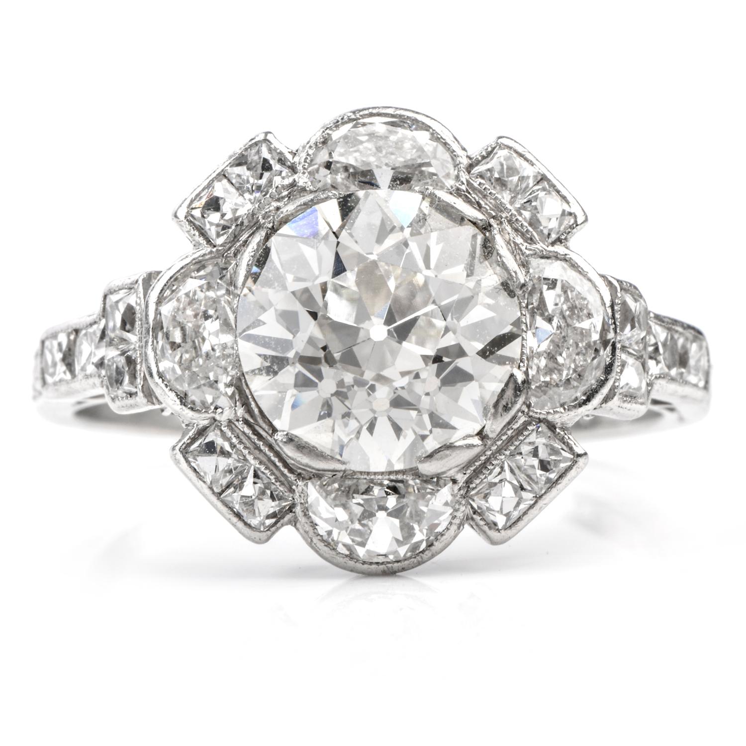 This Antique bright and vivid Diamond Engagement Cocktail Ring was inspired in a 

floral motif and crafted in Luxurious Platinum.

Featuring a round Old European Cut Diamond in the center weighing appx. 2.26 carats, 

this diamond is of I color and