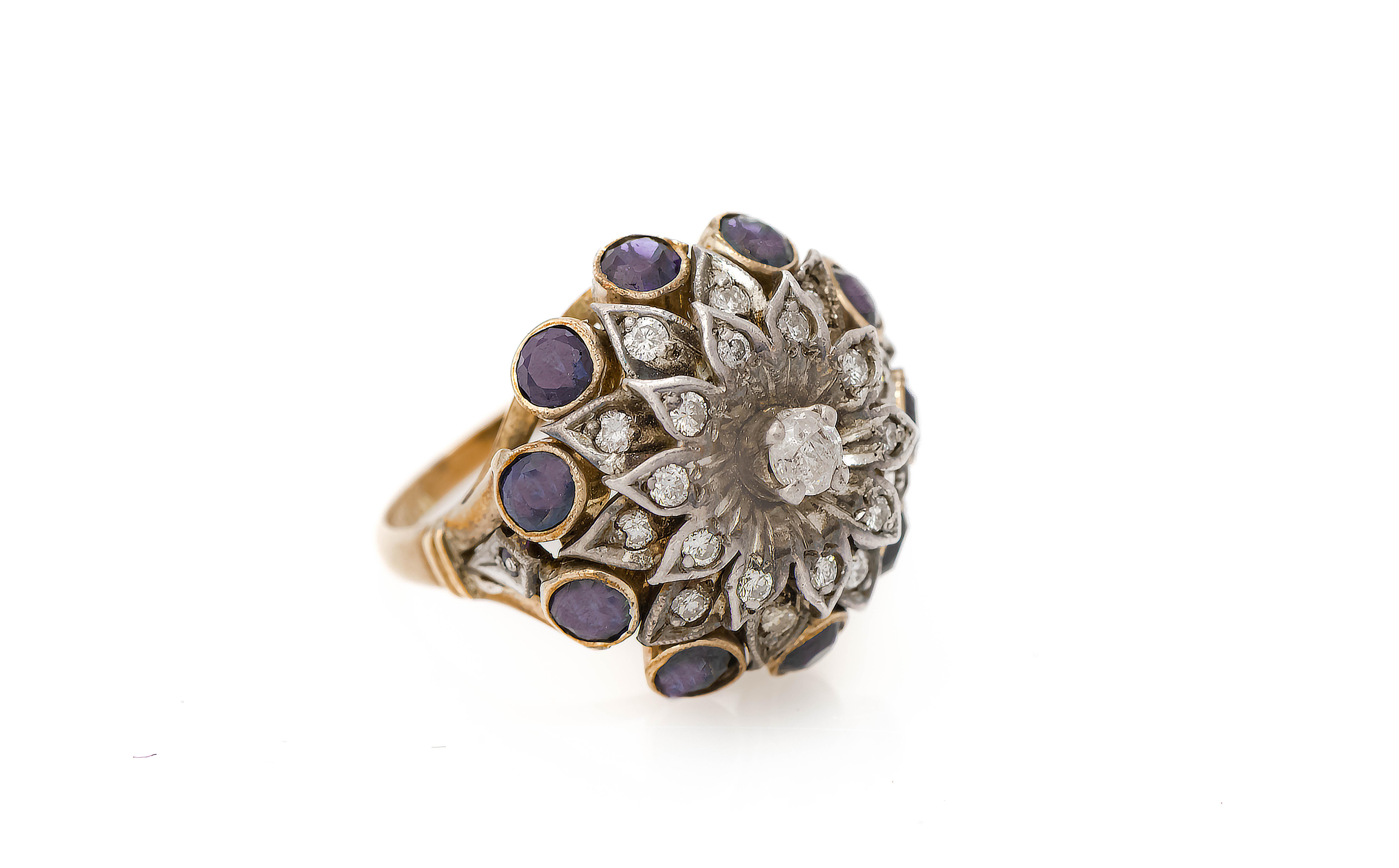 Antique Diamond flower Cocktail Ring 

A 14k yellow gold ring with 21 diamonds approximately .45 cts & 16 sapphires approximately .20 cts.

Ring Size: 5.5 

Resizable free of charge 