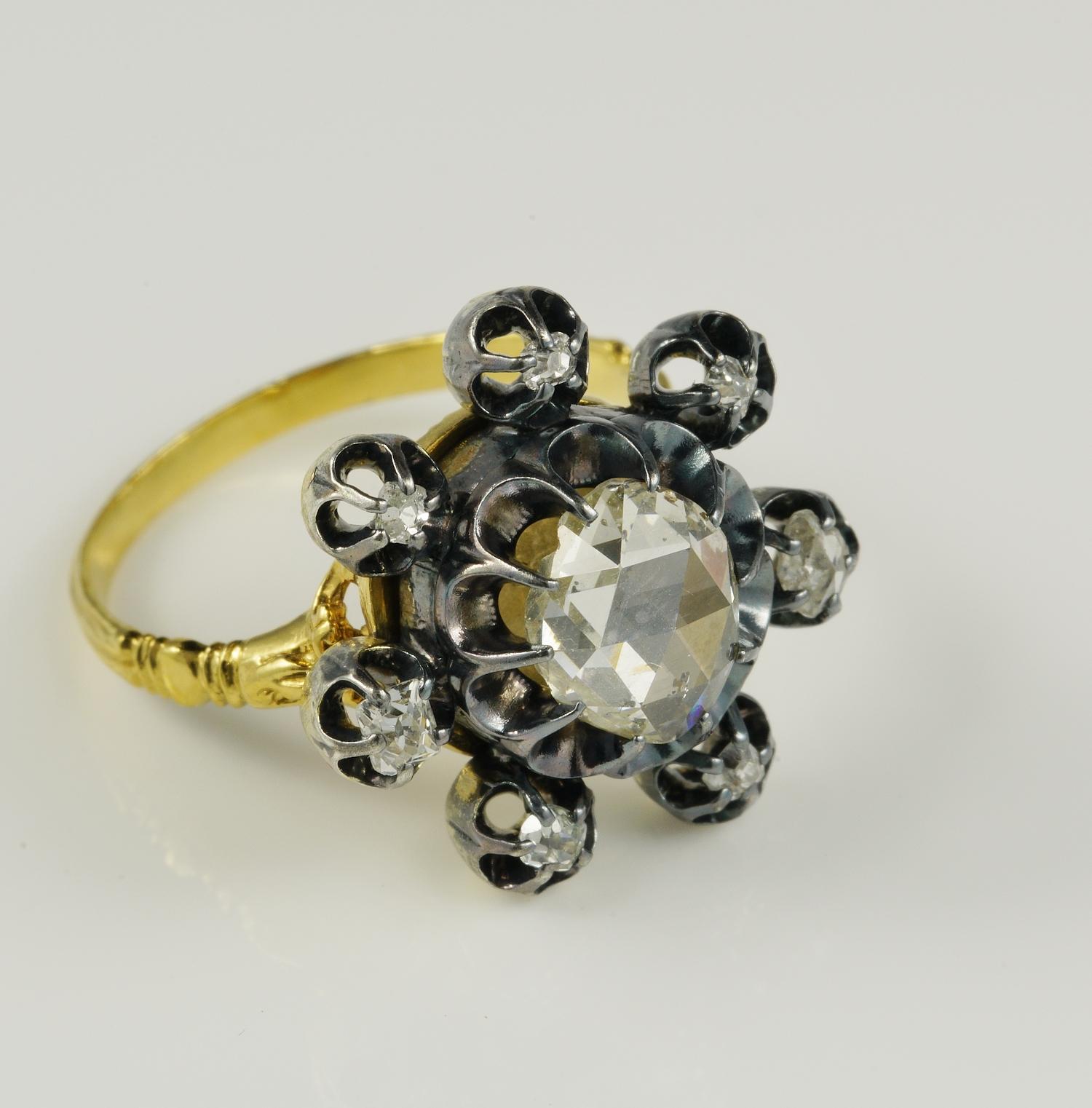 Jump to 1800!

This impressive Georgian period Diamond ring is an homage to woman beauty and grace

Large effective flower head, very much in vogue during the Georgian era, has been exquisitely made of solid 19/20 KT tested topped by silver
The