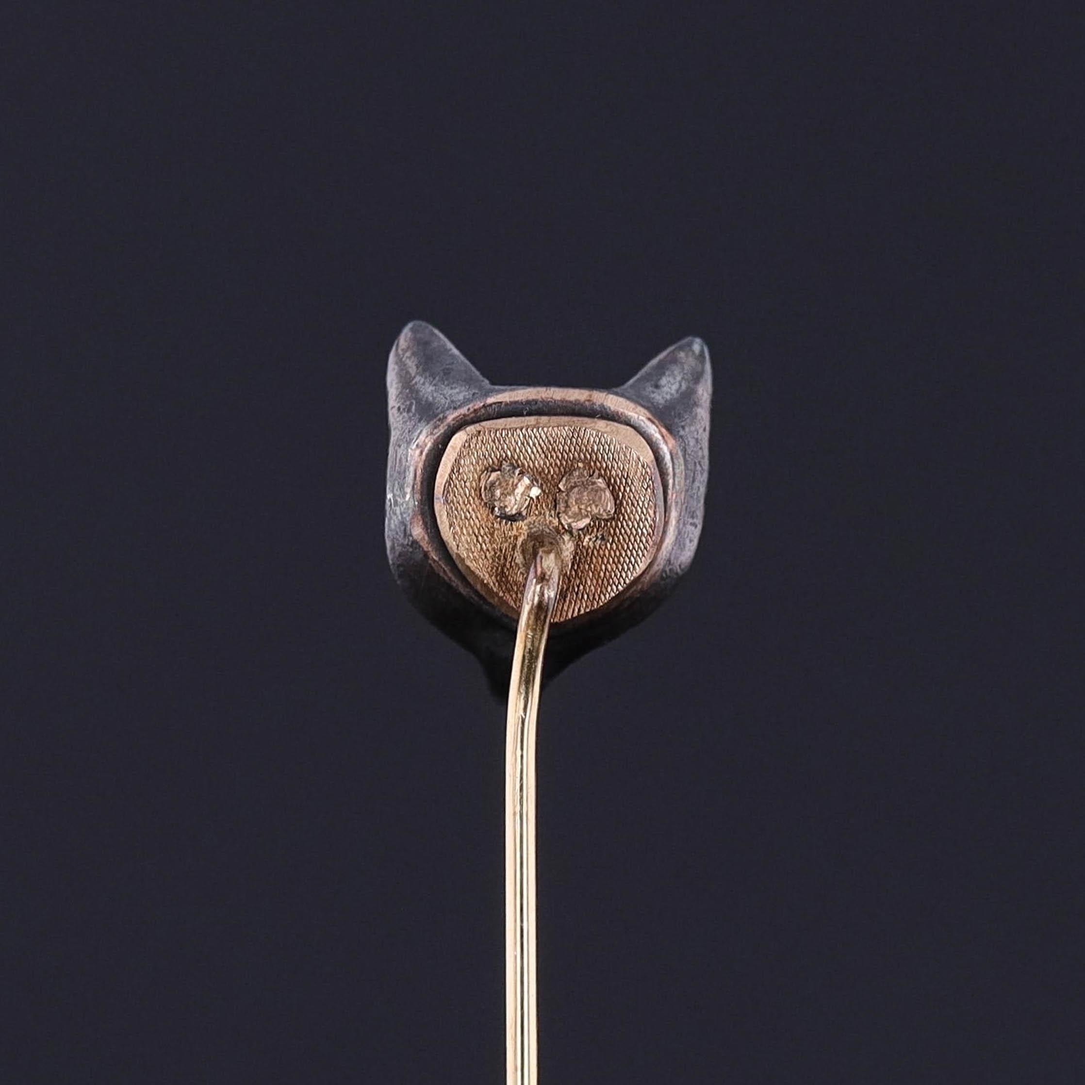 Antique Fox Stickpin: This antique stickpin (circa 1880) features a silver fox, studded with rose cut diamonds and ruby eyes, atop a 14k gold pin stem.

The pin head measures 0.5 inches by 0.4 inches wide with the entire pin measuring 2.1 inches. It