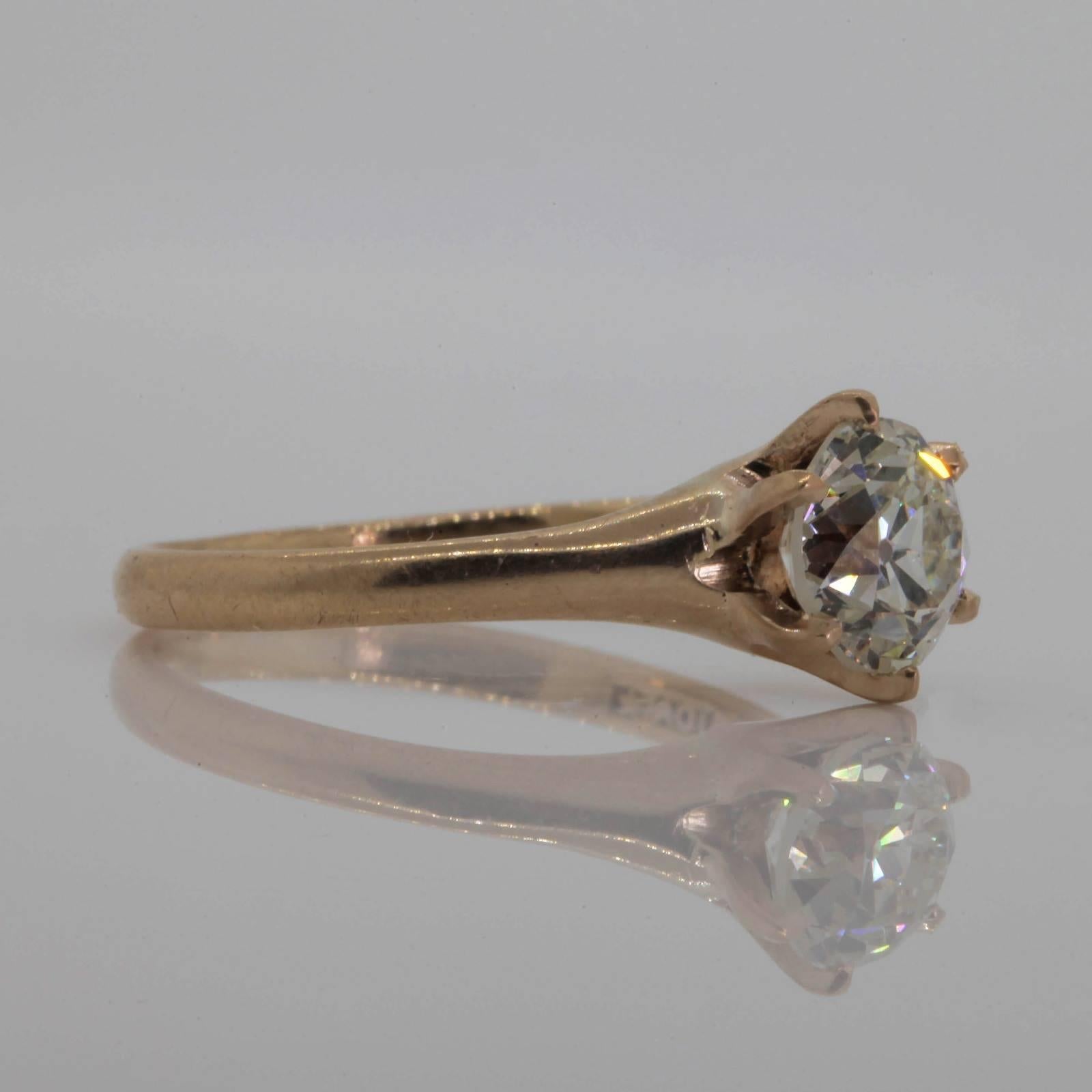 Coveted antique 14KT old cut Diamond ring.  The six prong setting flaunts a 1.32 carats sparkling Old European Cut Diamond, certified I color - SI1 clarity.  The band still preserves the manufacturer stamp 