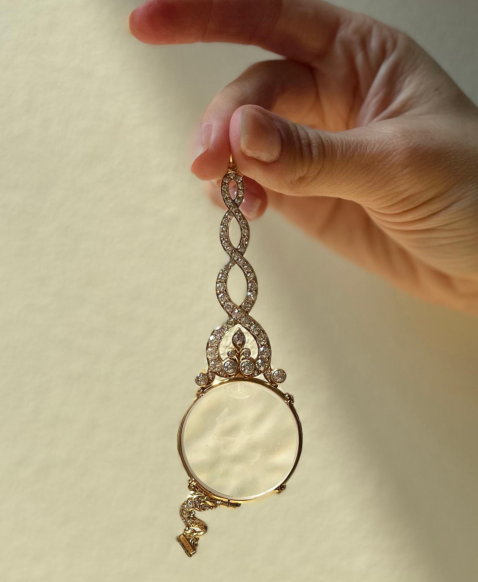 Antique 18k gold lorgnette, adorned with approx. 3.50ctw in H/VS-Si diamonds. The piece can be worn as a pendant. Measures 4.5