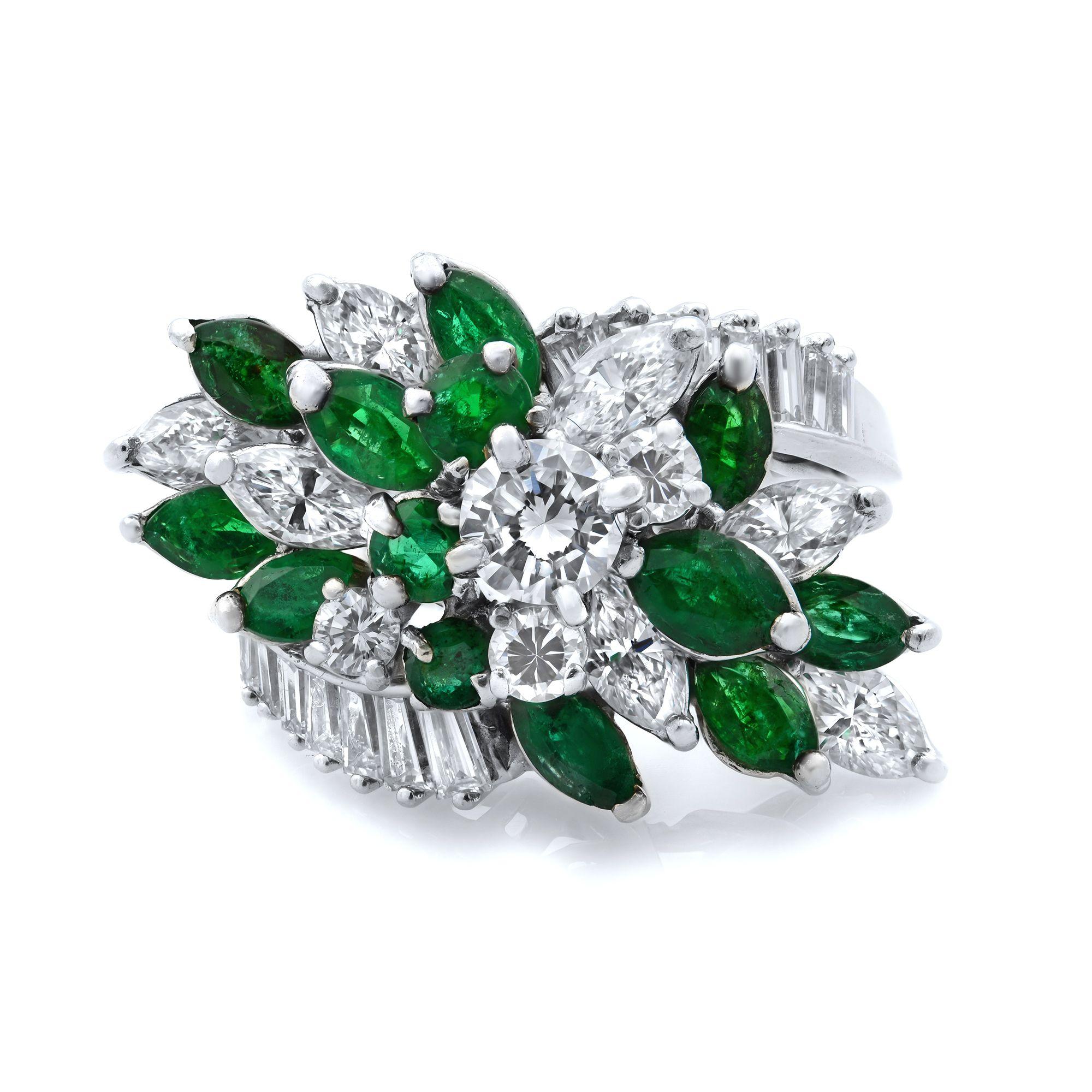 This beautiful antique style cocktail ring is set with white round, marquise and baguette cut diamonds mixed with green marquise cut emeralds. The ring is perfect for any occasion which demands trend. Crafted in platinum. Ring size 7.  Main stone: