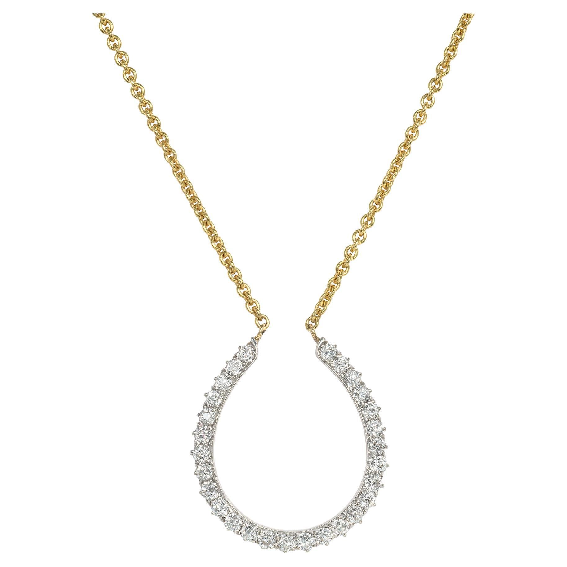 Diamond Platinum Pendant Suspended from a Platinum Chain For Sale at