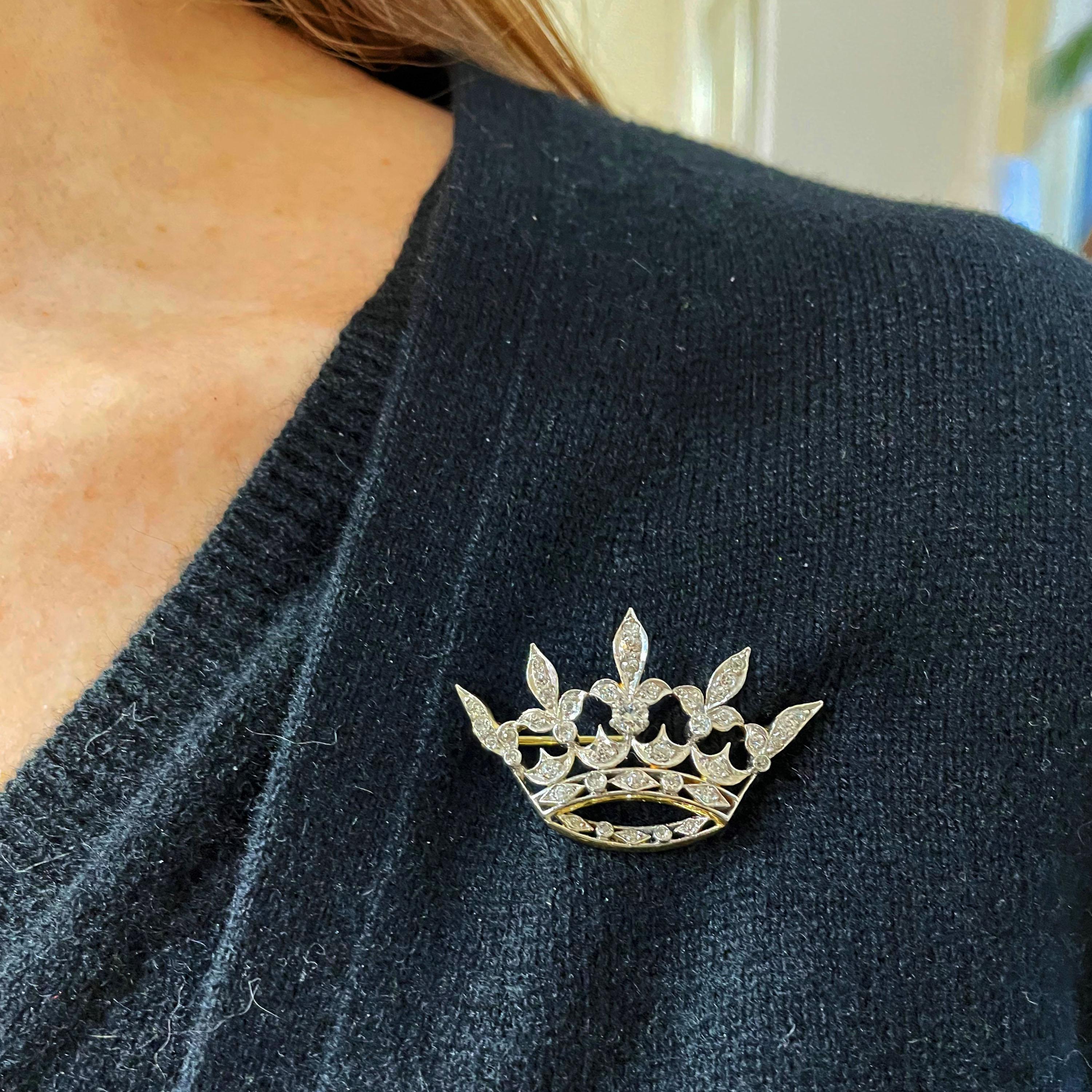 An antique diamond crown brooch, set with Edwardian and old-cut diamonds, mounted in yellow gold with platinum settings, circa 1915.