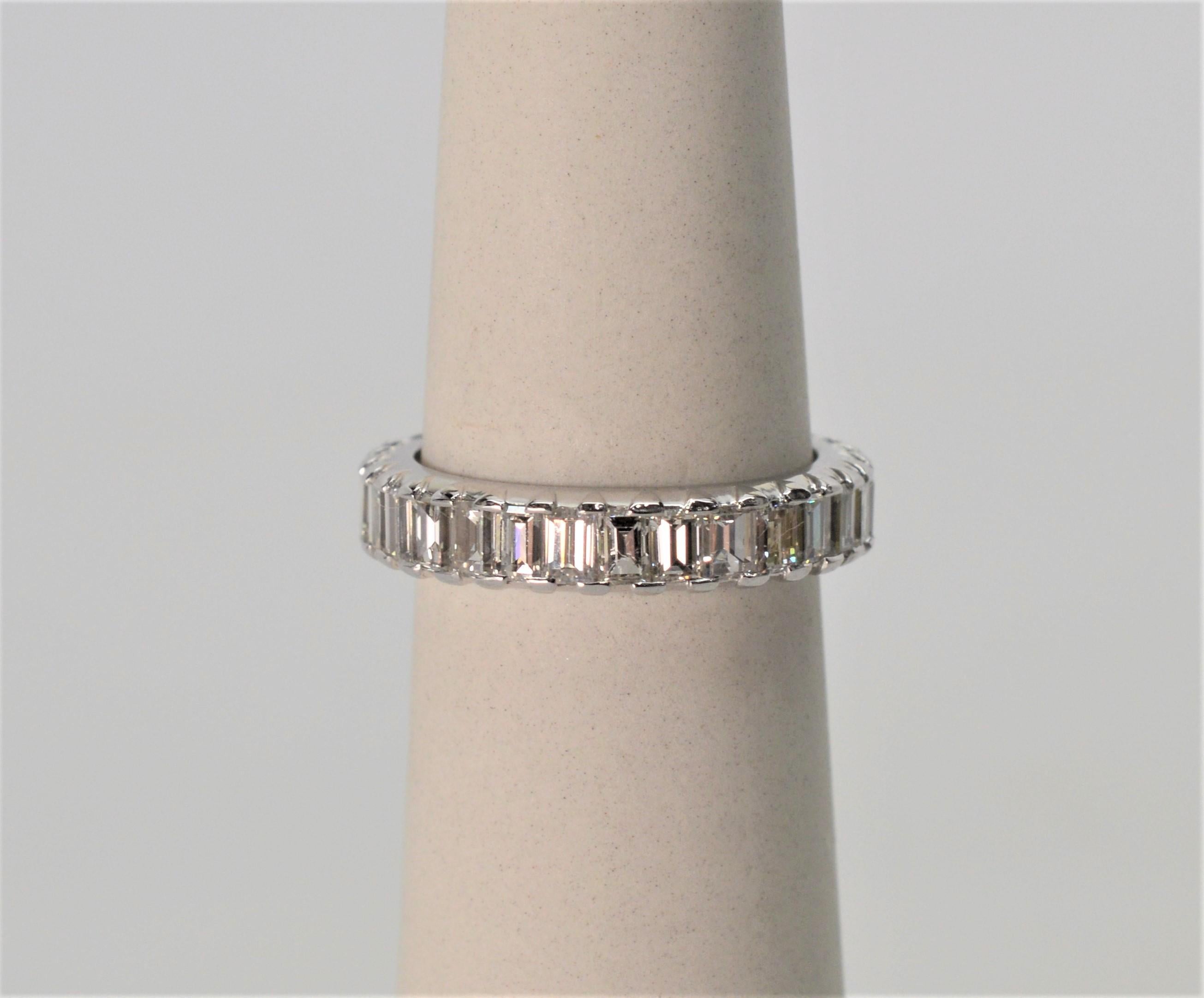 Antique Diamond and Platinum Eternity Ring. Size 6-3/4. Has thirty fine white G/VS .13 carat baguette diamonds for a total weight of 3.90 carats. 
In gift bag.