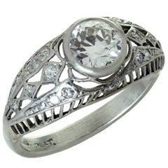 Bague de fiançailles filigrane ancienne en platine avec diamants