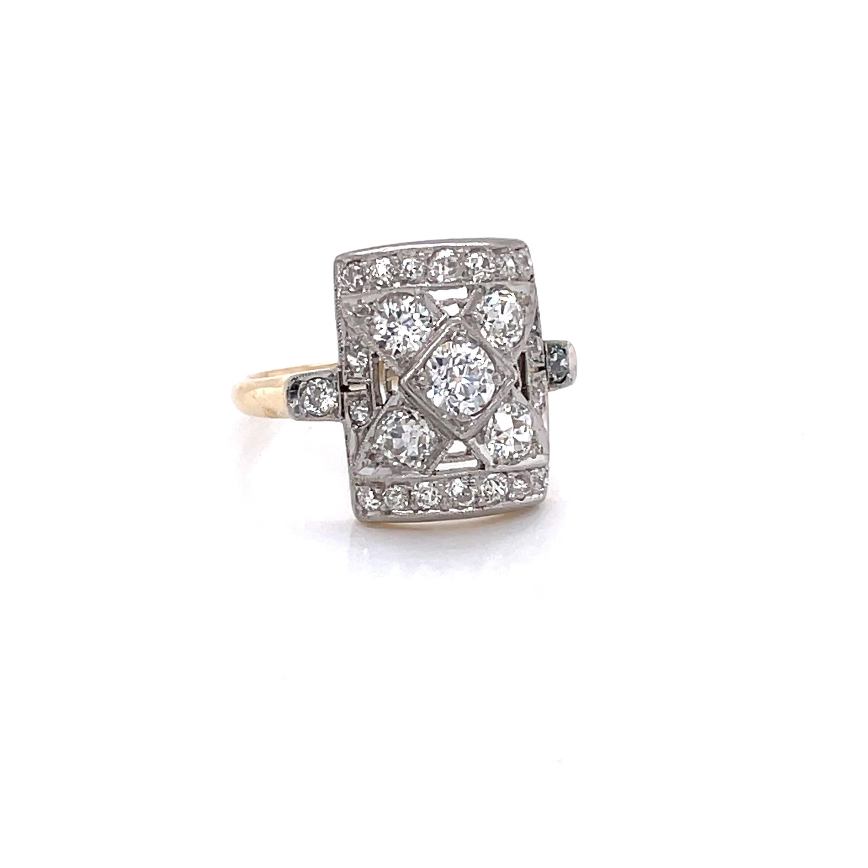 Set in platinum are twenty three Miner's Cut H/VS diamonds, 1.25 carats total weight, beautifully arranged in a lattice inspired design on this fine antique ring. The unique rectangular shaped table of the ring measures a generous 11 x 14.5mm and is